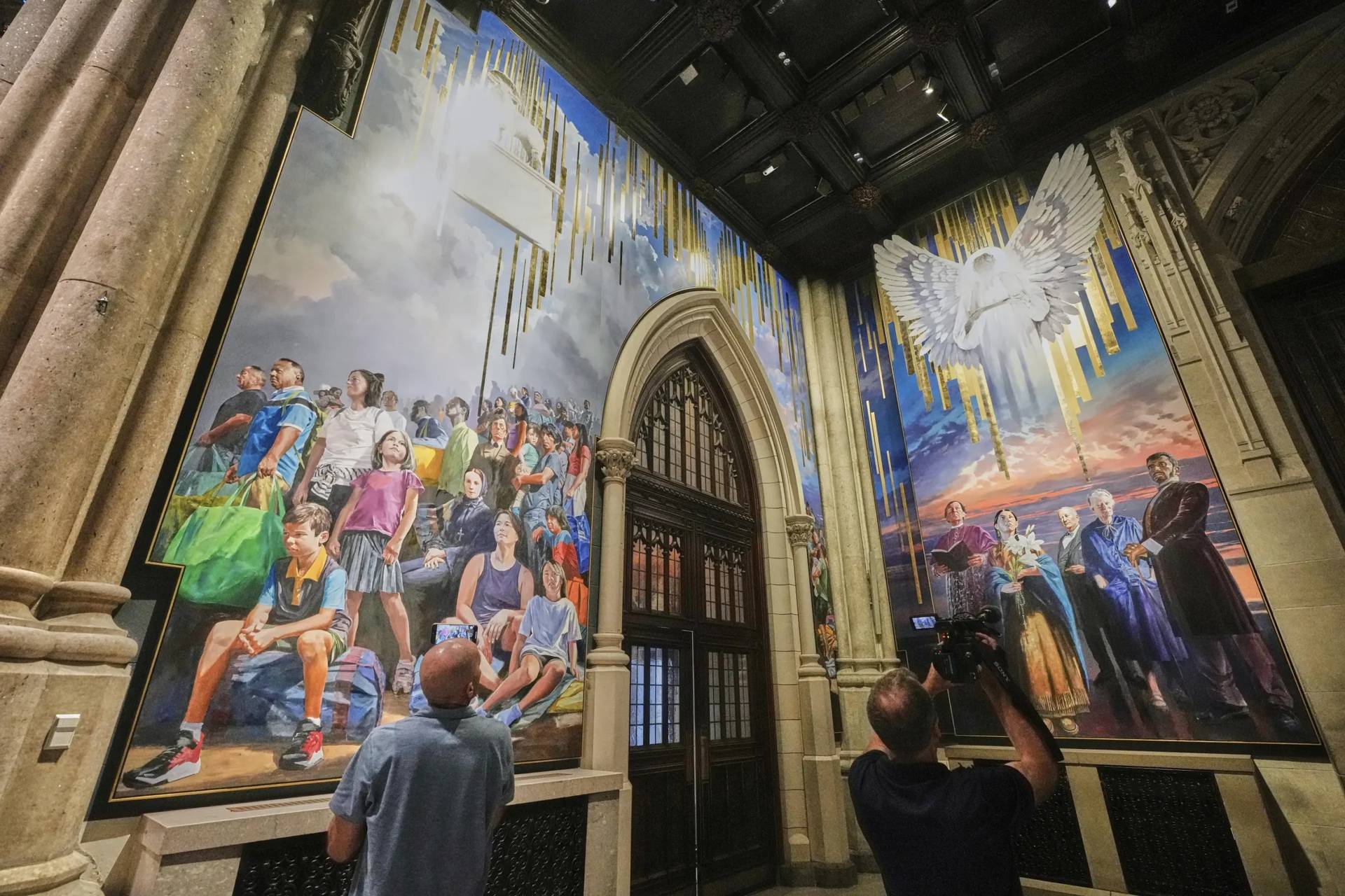 Photographers in front of a mural by artist Adam Cvijanovic in St. Peter's Cathedral in New York City on Sep. 18, 2025. (Credit: Richard Drew/AP.)