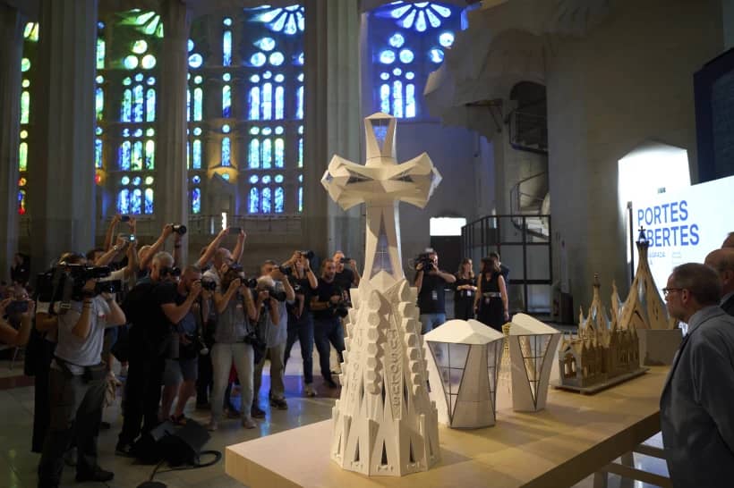 Miniature replicas of the new central tower that will crown the Basilica of the Sagrada Familia, making it the largest Christian church in Europe, are displayed during a press conference in Barcelona, Spain, Thursday, Sept. 18, 2025. (Credit: Emilio Morenatti/AP.)