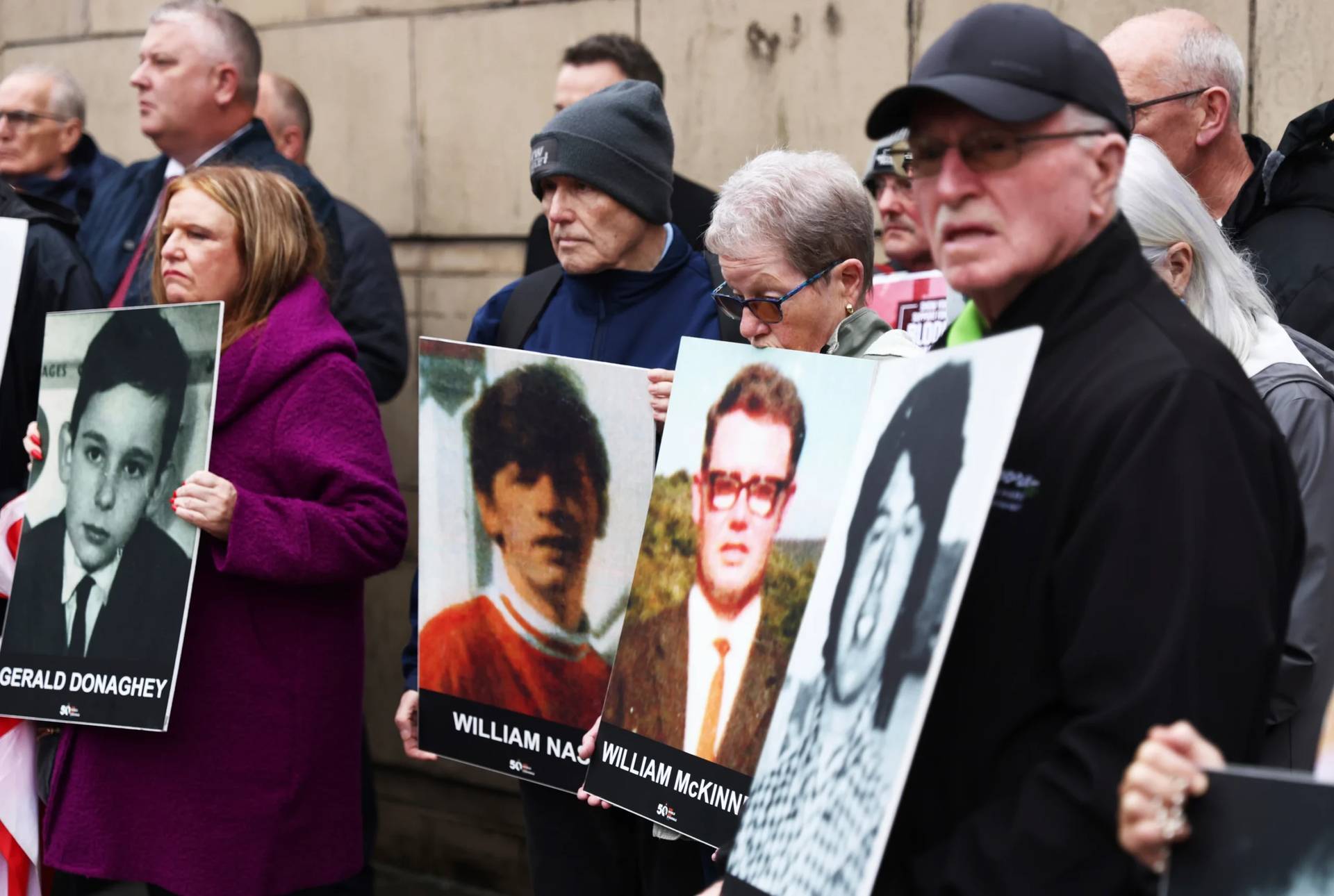 Families of the Victims of the 1972 Bloody Sunday hold a protest outside Belfast Crown court in Northern Ireland on Sep. 15, 2025. (Credit: Peter Morrison/AP.)
