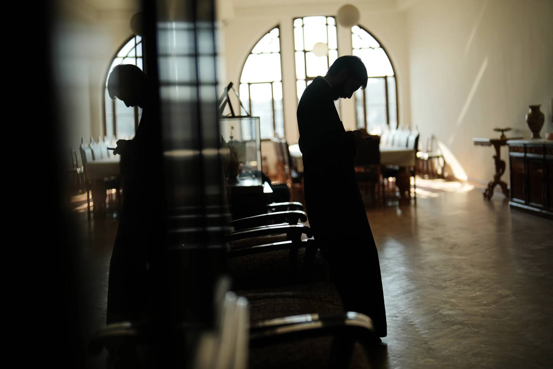 A Christian Orthodox clergy stands in one of the corridors of the Christian Orthodox Halki Theological school, at the Holy Trinity monastery, in Heybeliada island, Istanbul, Turkey, Friday, Nov. 14, 2025. (Credit: Francisco Seco/AP.)