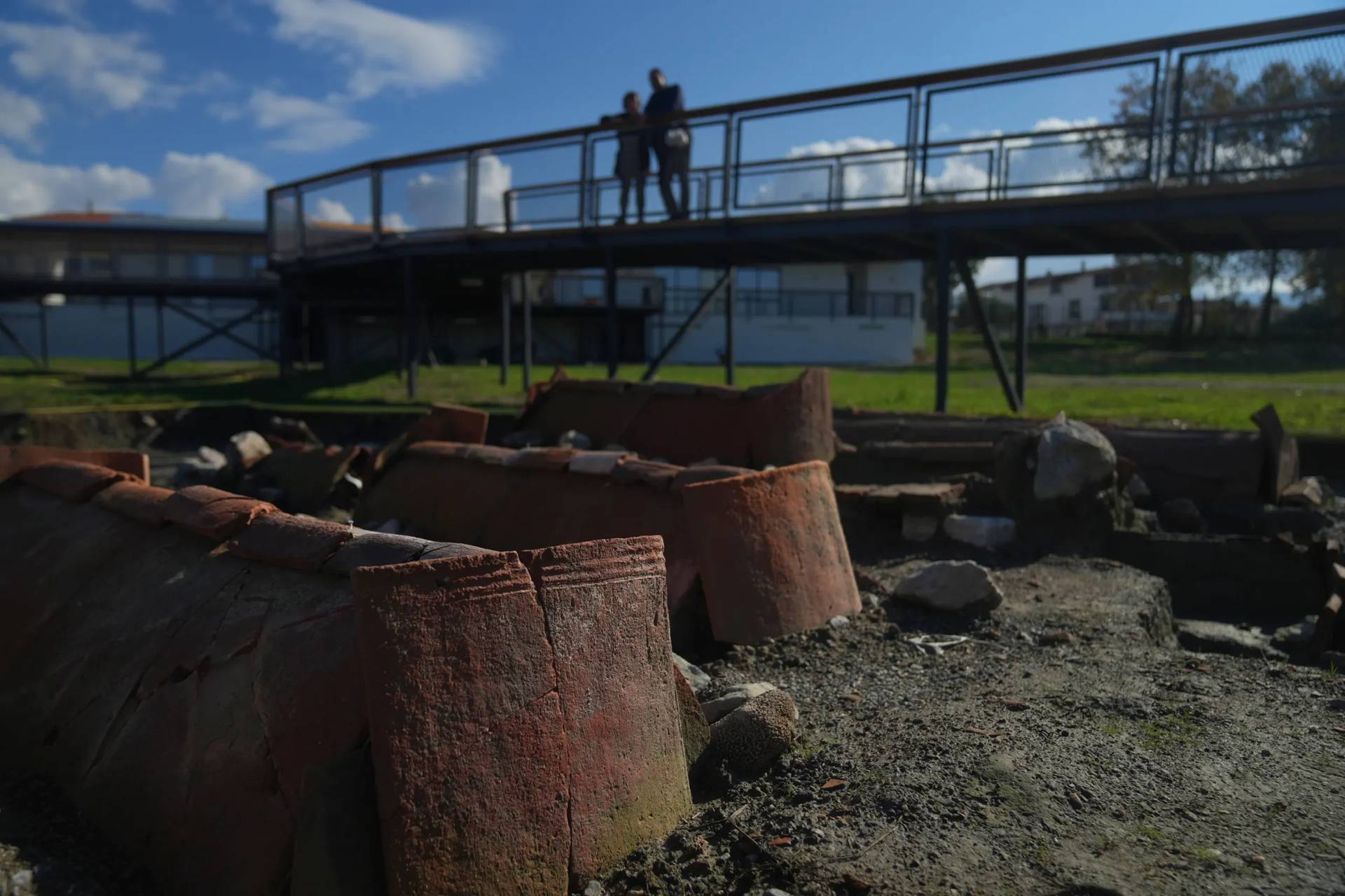 Visitors look at tombs at archaeological excavations of the ancient Byzantine-era Christian Saint Neophytos Basilica, in Iznik, also known by its ancient name Nicaea, northwestern Turkey, Thursday, Nov. 13, 2025, ahead of the visit of Pope Leo XIV to mark the 1,700th anniversary of the First Council of Nicaea. (Credit: Francisco Seco/AP.)