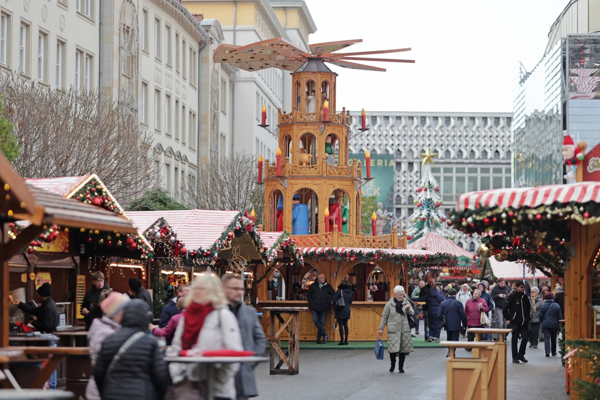 Visitors walk through the Magdeburg Christmas market, in Magdeburg, Germany, Thursday, Nov. 20, 2025. (Credit: Matthias Bein/dpa via AP.)