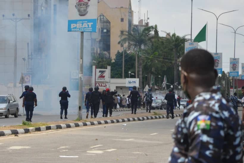 Police fire tear gas at protesters demanding the release of separatist leader Nnamdi Kanu in Abuja, Nigeria, Monday, Oct. 20, 2025. (Credit: Gbemiga Olamikan/AP.)