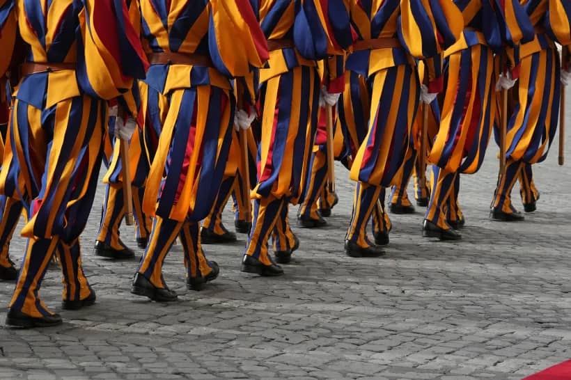 Swiss Guards march in the St. Damasus Courtyard at the Vatican on Oct. 23, 2025. (Credit: Andrew Medichini/AP.)