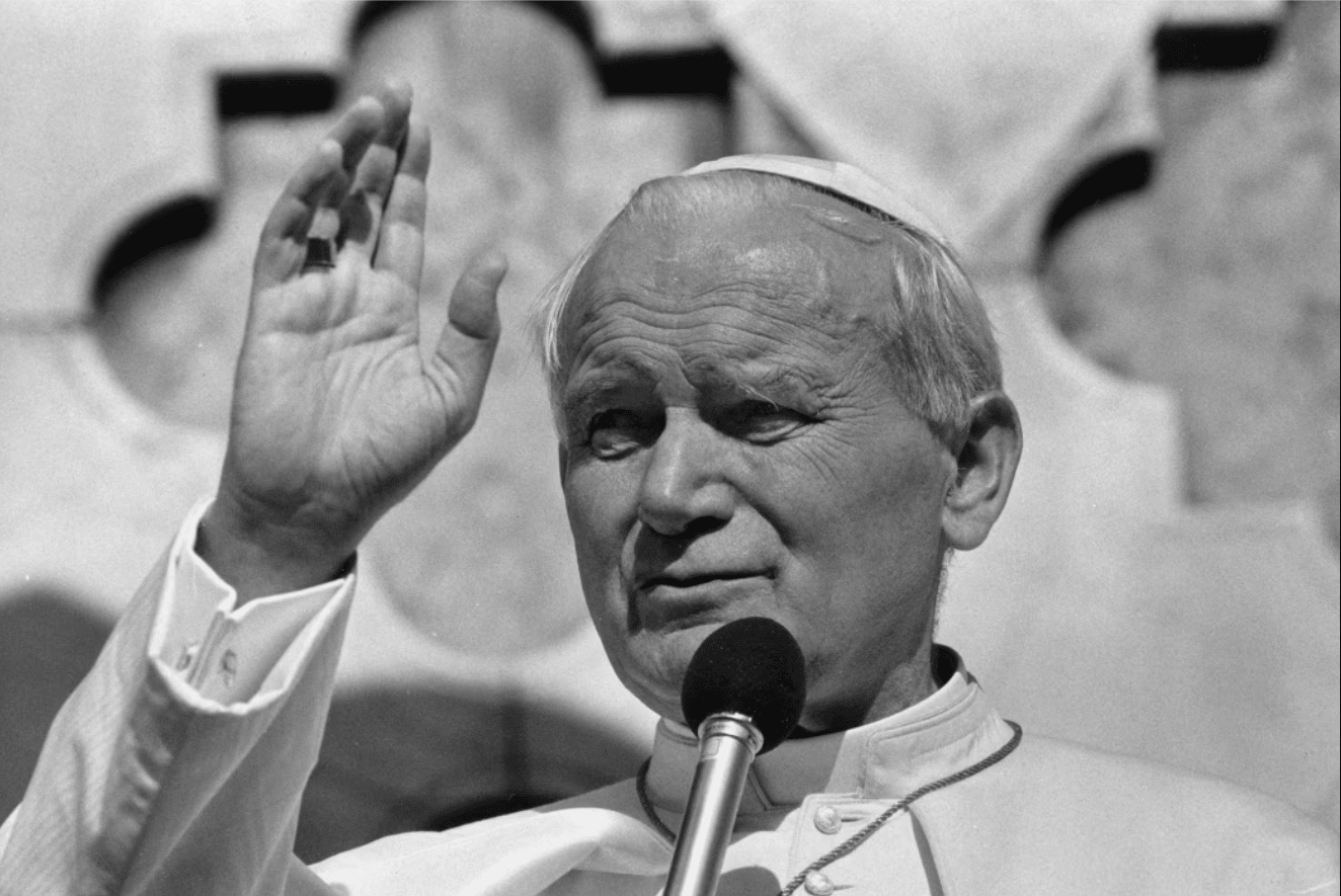 Pope John Paul II gives the noon blessing in Perugia, Italy, October 26, 1986. (Credit: Gianni Foggia/Associated Press.)