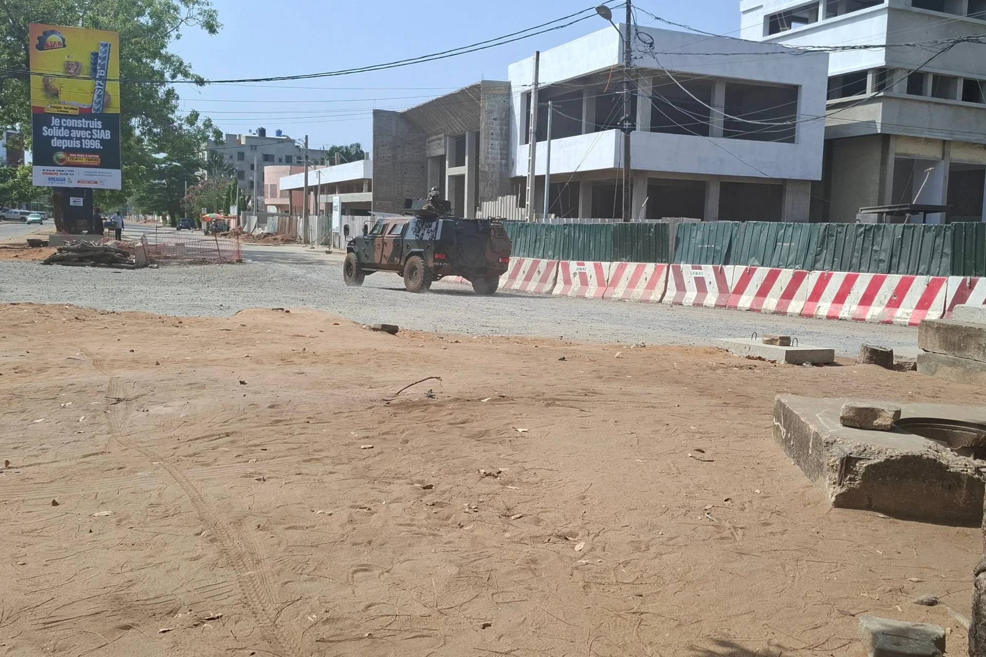 Soldiers ride in a military vehicle during an attempted coup in Cotonou, Benin, on Dec. 7, 2025. (Credit: Associated Press.)