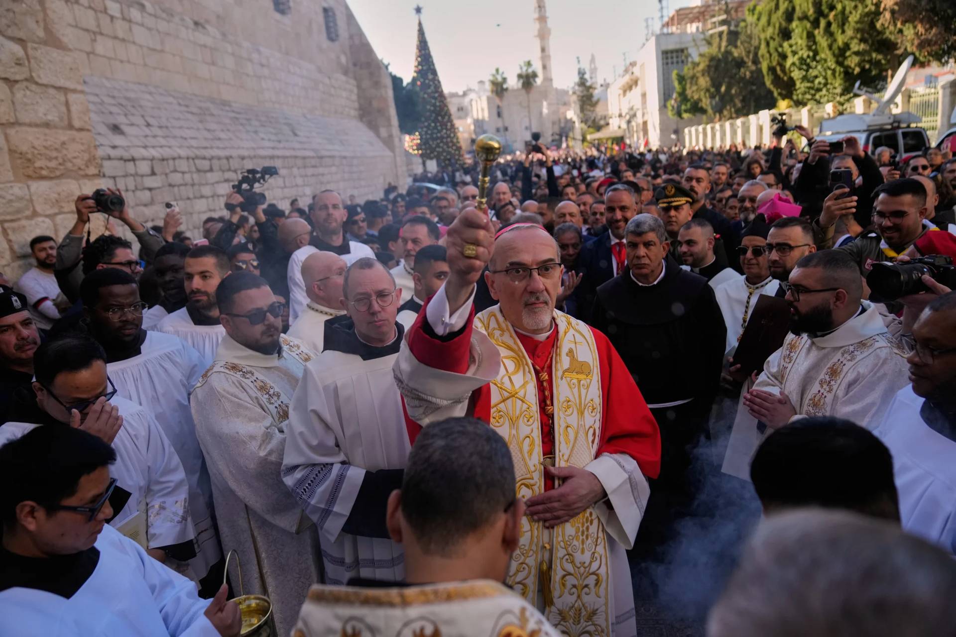 Latin Patriarch Pierbattista Pizzaballa, the top Catholic clergyman in the Holy Land, arrives at the Church of the Nativity, traditionally believed to be the birthplace of Jesus, on Christmas Eve, in the West Bank city of Bethlehem, Wednesday, Dec. 24, 2025. (Credit: Nasser Nasser/AP.)