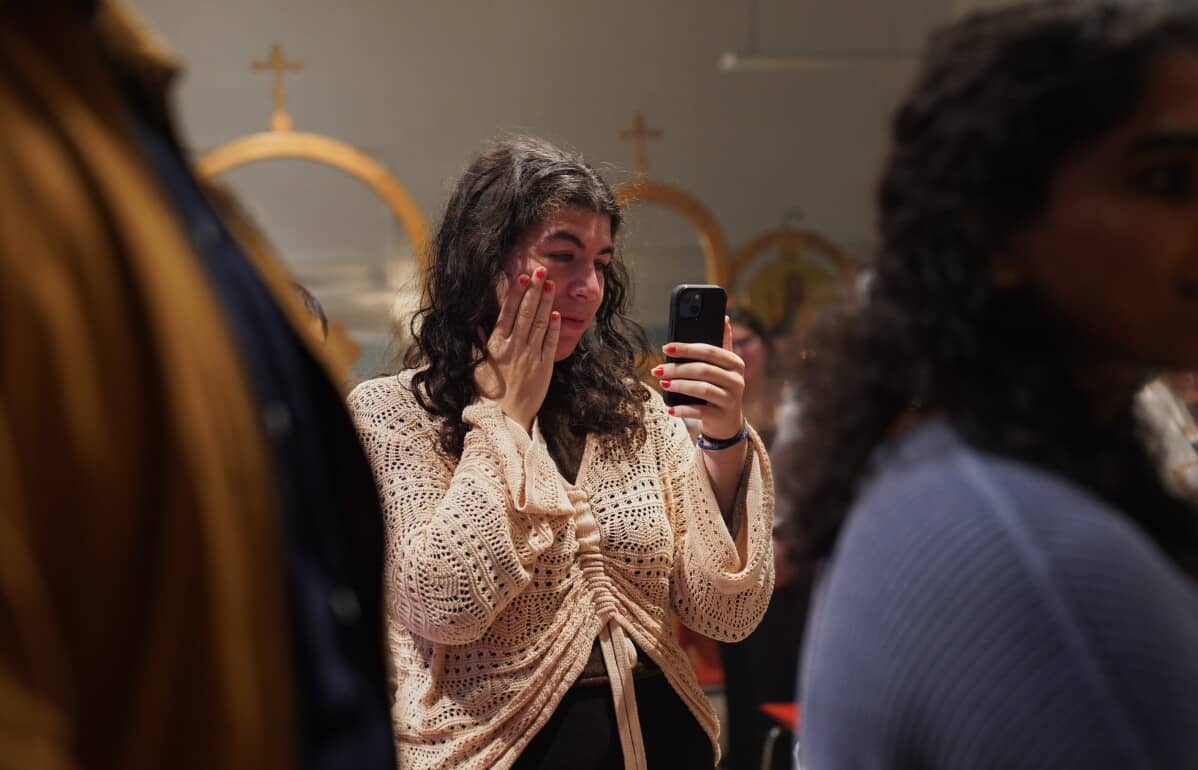 Members of St. Moses the Black Orthodox Church worship together during service on Sunday, Nov. 9, 2025, in Pittsburgh. (Credit: Jessie Wardarski/AP.)