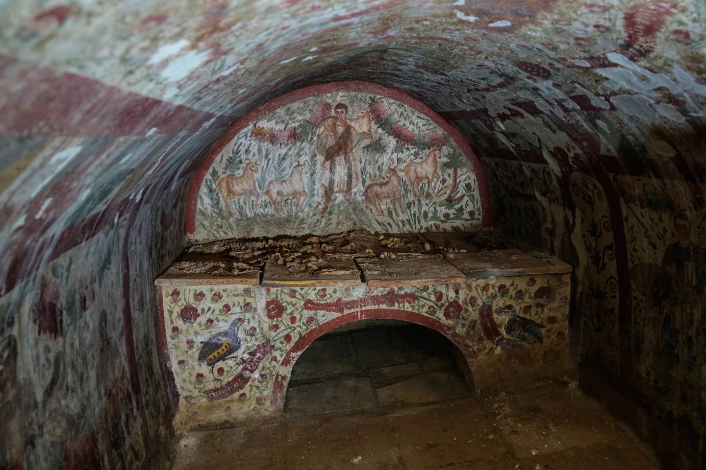A fresco depicting Jesus as the "Good Shepherd" adorns the wall of a 3rd-century tomb in Hisardere, where archaeologists uncovered one of Anatolia's best-preserved early Christian artworks, in Iznik, Turkey, Friday, Dec. 12, 2025. (Credit: Khalil Hamra/AP.)