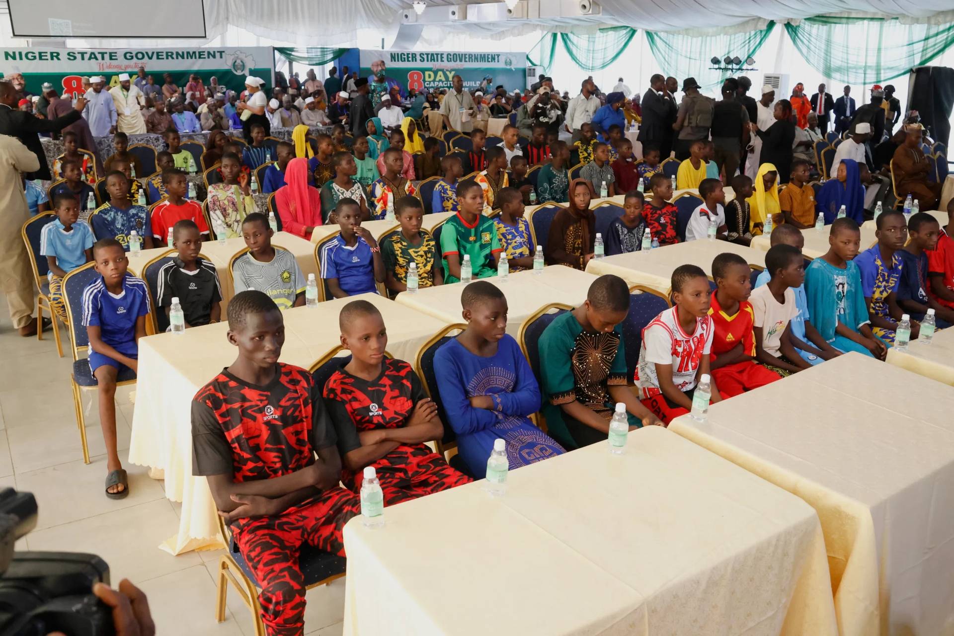 Freed students of the St. Mary's Catholic School in the Papiri community upon arrival at the government house in Minna, Nigeria on Dec. 8, 2025. (Credit: Associated Press.)