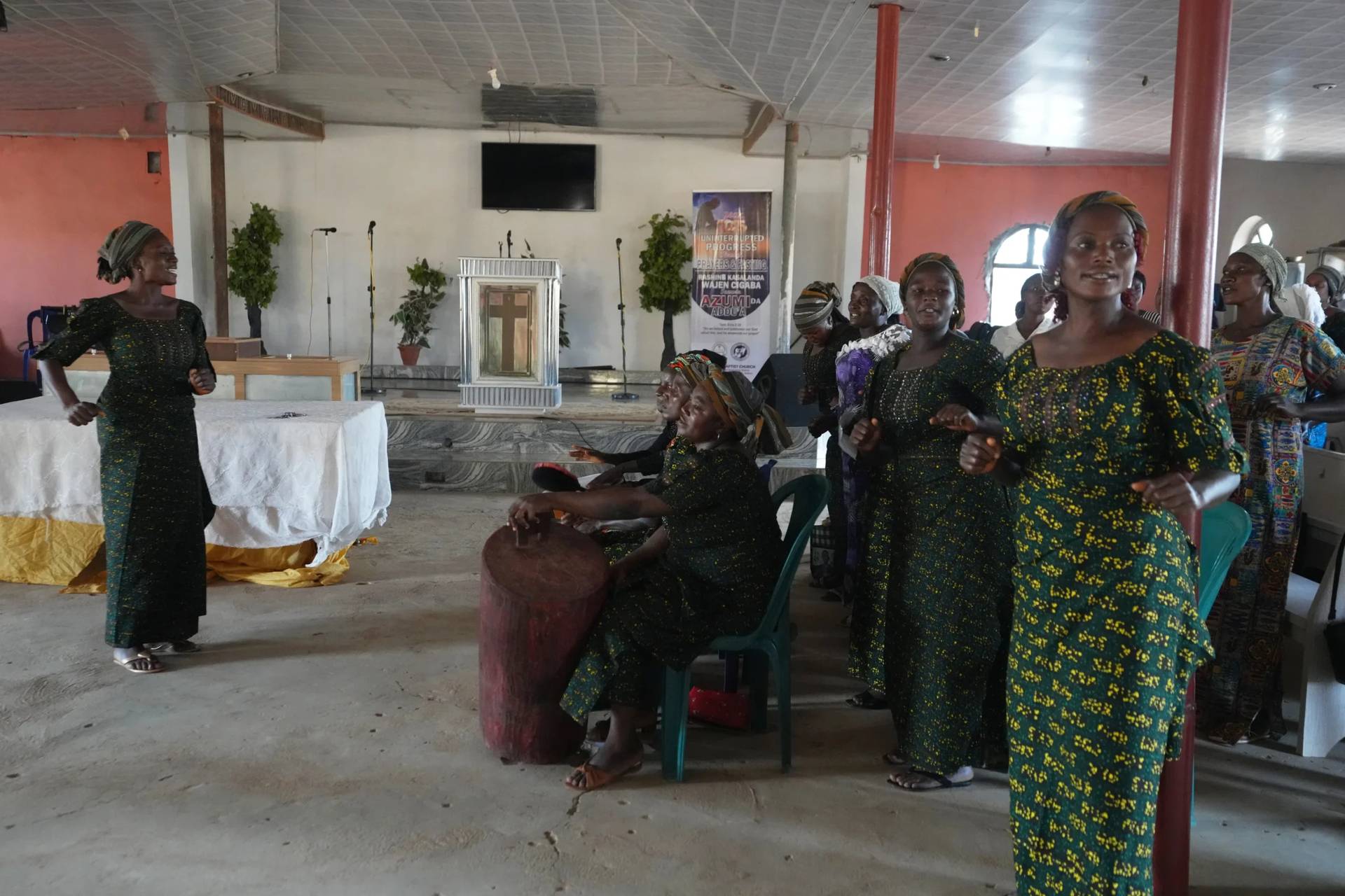Christian women sing and dance at a church in Kaduna, Nigeria, on Nov. 5, 2025. (Credit: Sunday Alamba/AP.)