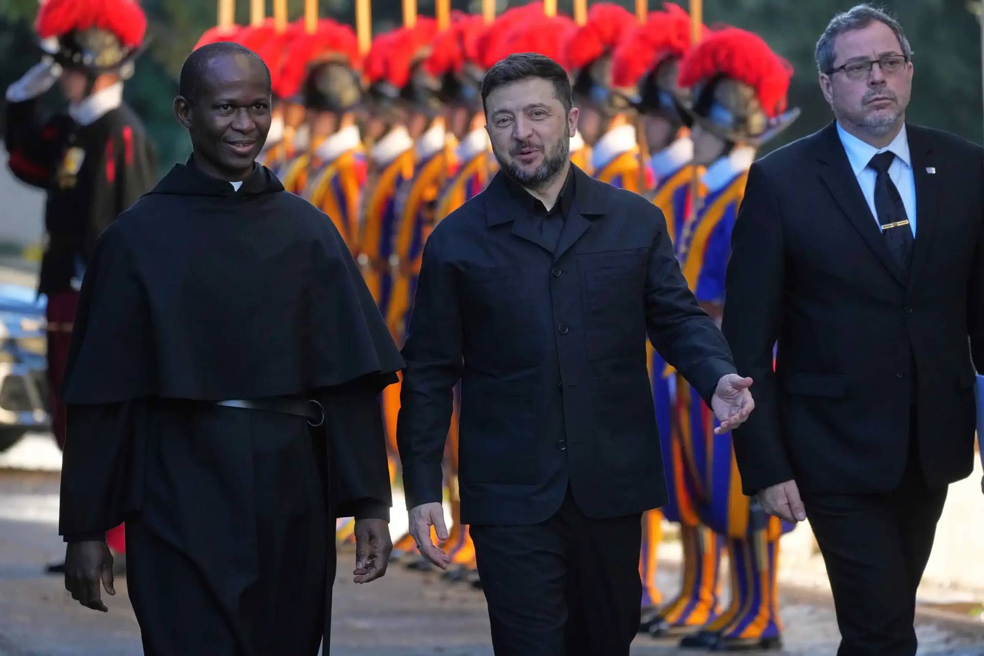 Ukraine President Volodymyr Zelenskyy, center, arrives to meet with Pope Leo XIV in Castel Gandolfo, Italy, Tuesday, Dec. 9, 2025. (Credit: Andrew Medichini/AP.)