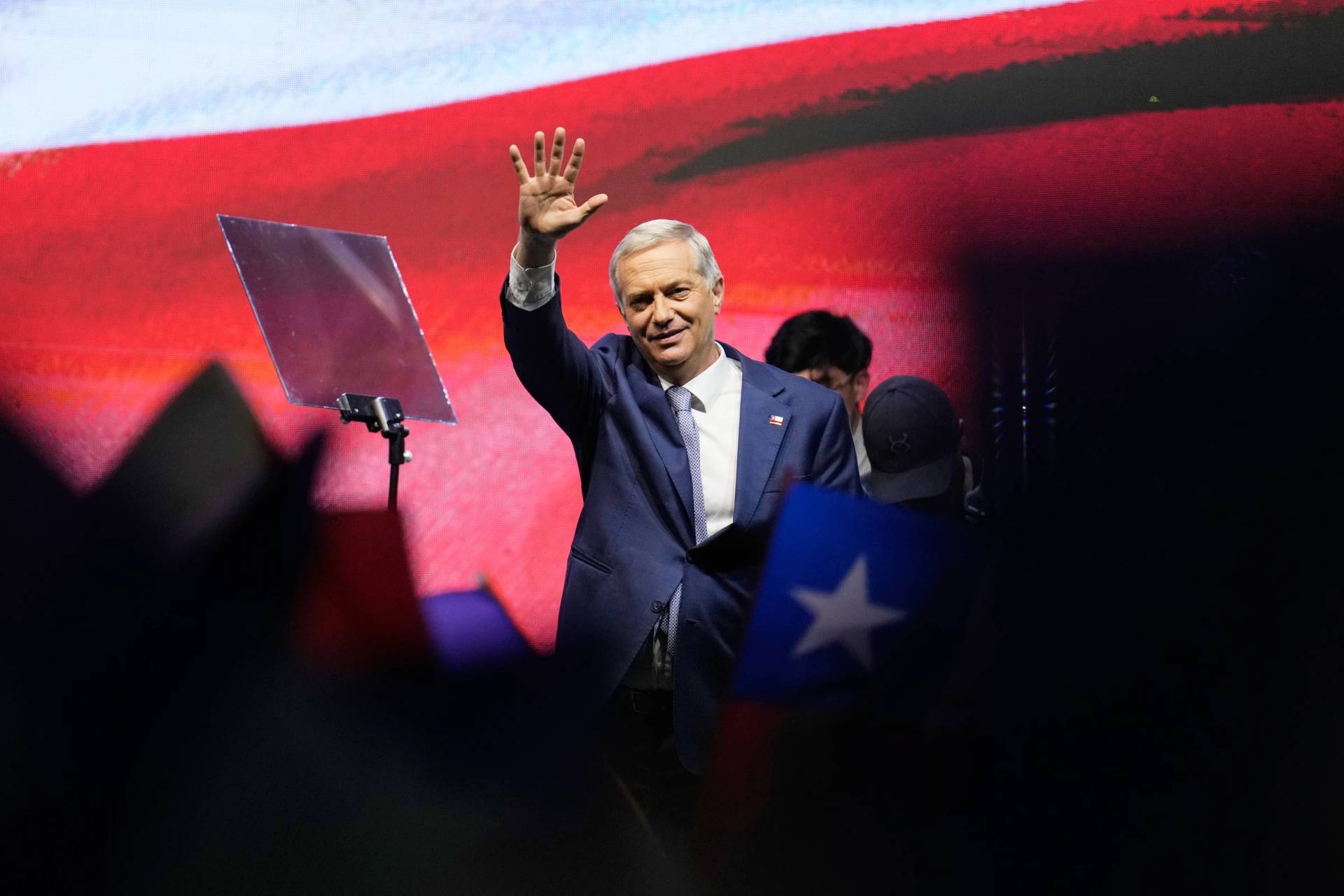 Presidential candidate Jose Antonio Kast, of the opposition Republican Party, waves after winning the presidential runoff election in Santiago, Chile, Sunday, Dec. 14, 2025. (Credit: Matias Delacroix/AP.)