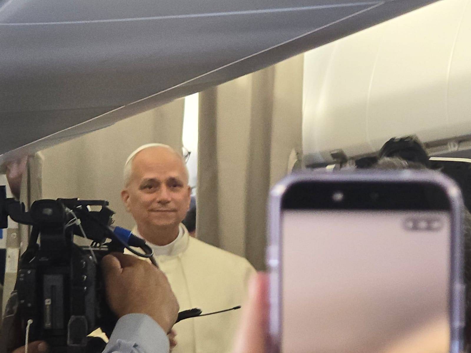 Pope Leo XIV on the plane to Rome from Lebanon on Dec. 2, 2025. (Credit: Elise Ann Allen/CruxNow.com)