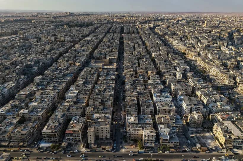 A general view shows the Sheikh Maqsoud neighborhood of Aleppo, Syria, Tuesday, Oct. 7, 2025. (Credit: Omar Albam/AP.)