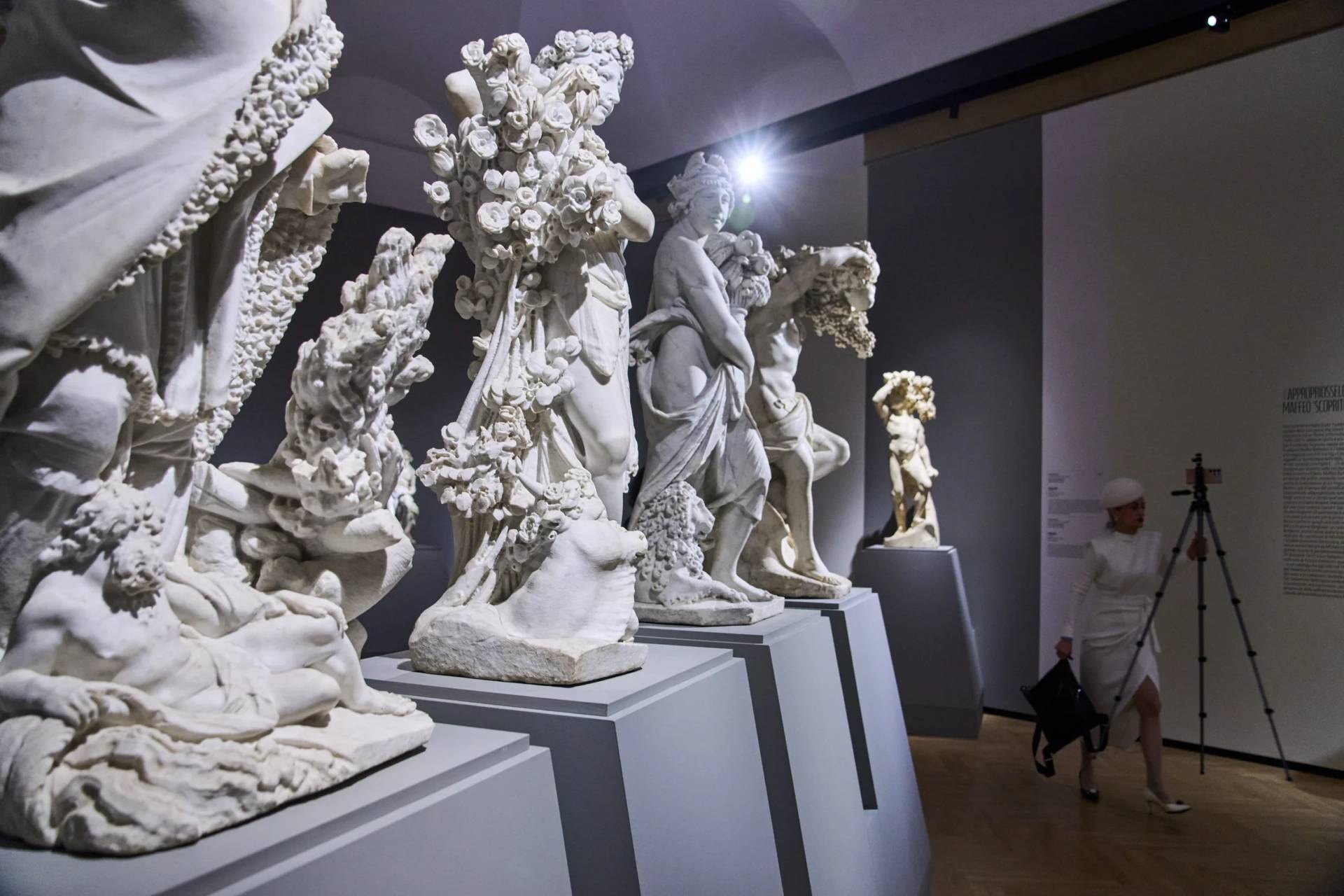 Journalists attend the press preview of the exhibition "Bernini and the Barberini" at Palazzo Barberini in Rome on Feb. 11, 2026, with the marble statues from The Four Seasons cycle by Pietro Bernini and his son Gian Lorenzo Bernini on display. (Credit: Domenico Stinellis/AP.)