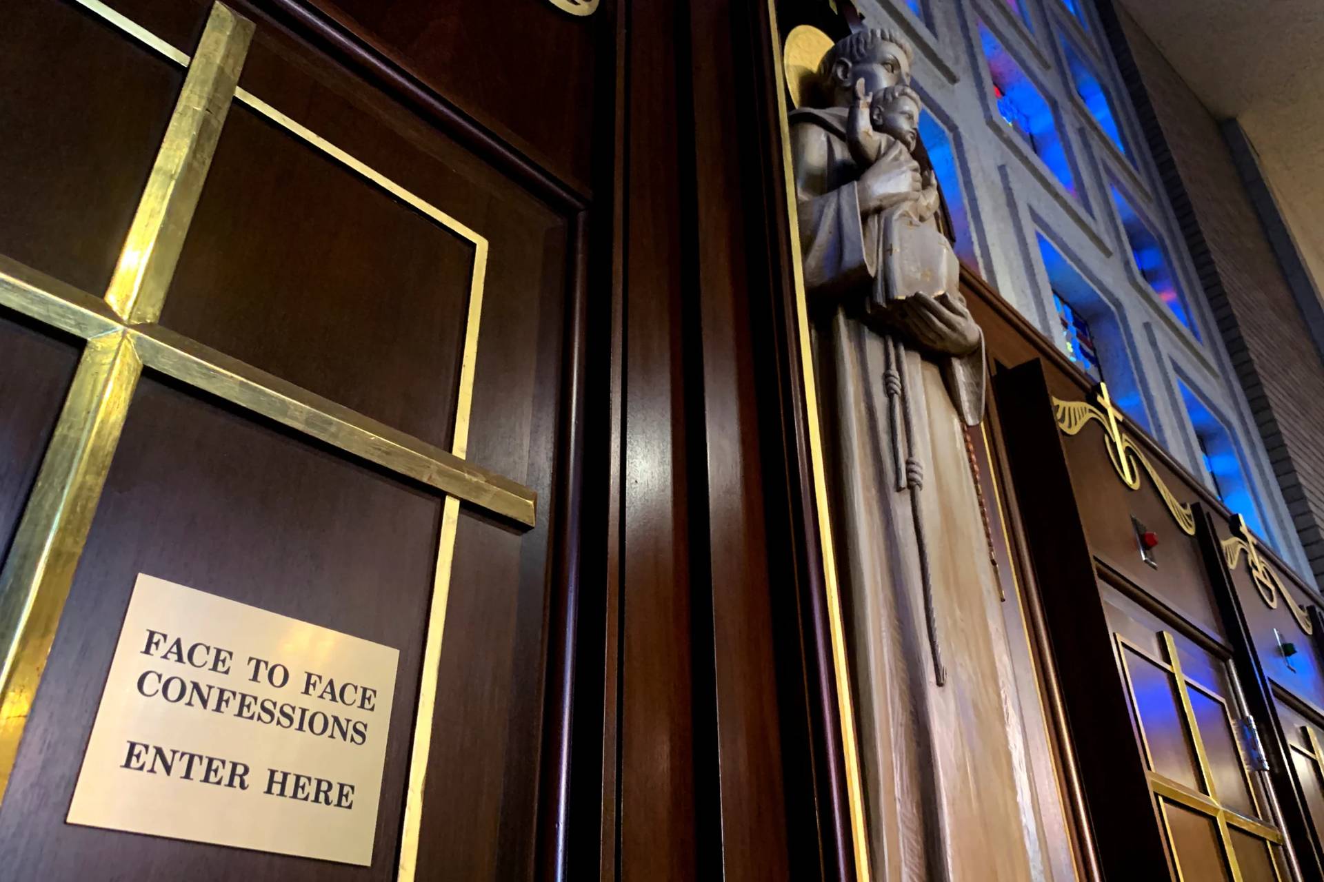 Gold crosses and statues adorn confessional rooms at St. Michael Archangel Catholic Church in Houston, on April 13, 2019. (Credit: Wong Maye-E/AP.)