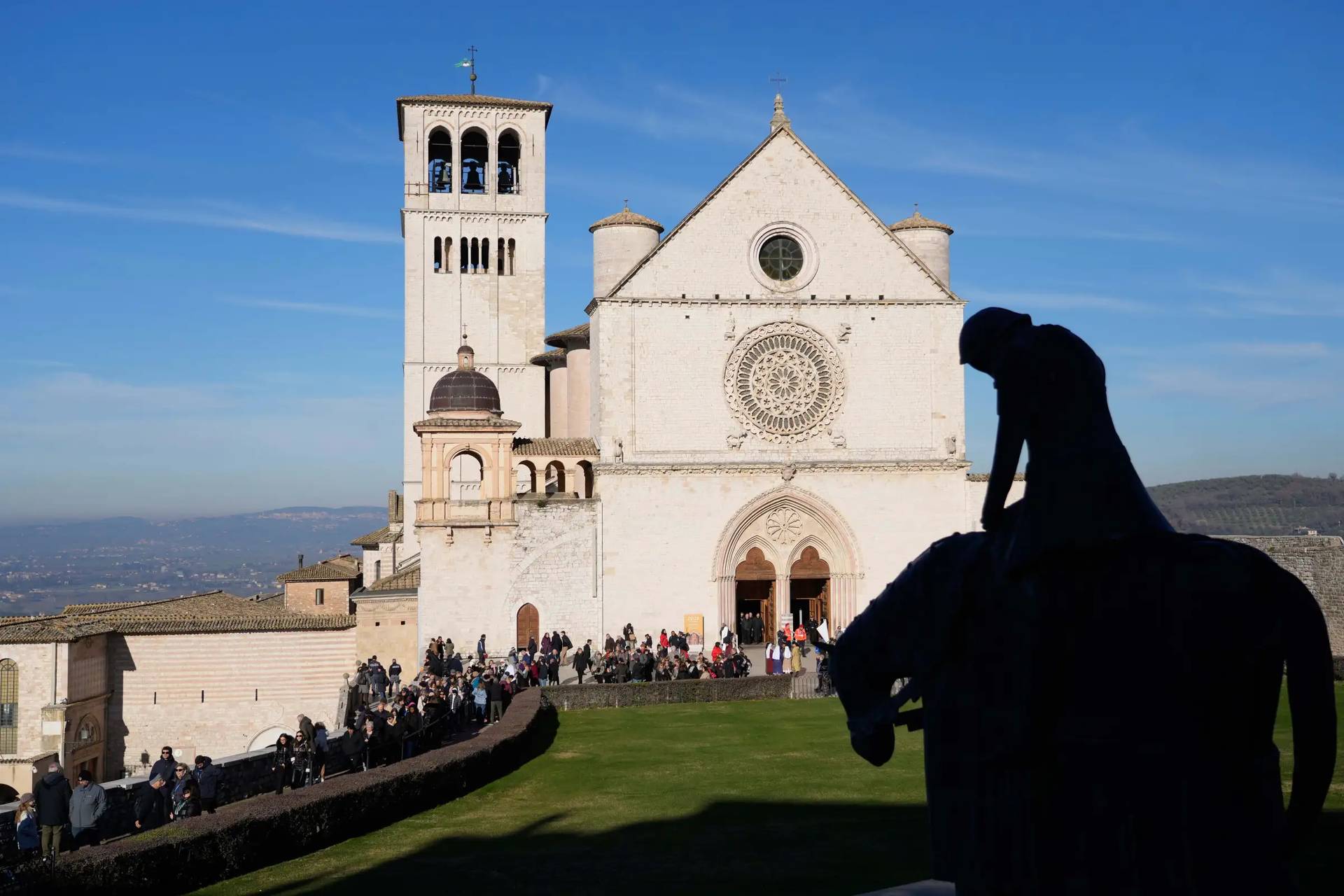 Pilgrims leave after they honored the bones of St. Francis during the first public display inside the St. Francis Basilica, marking the 800th anniversary of the saint’s death, in Assisi, Italy, Sunday, Feb. 22, 2026.(Credit: Gregorio Borgia/AP.)