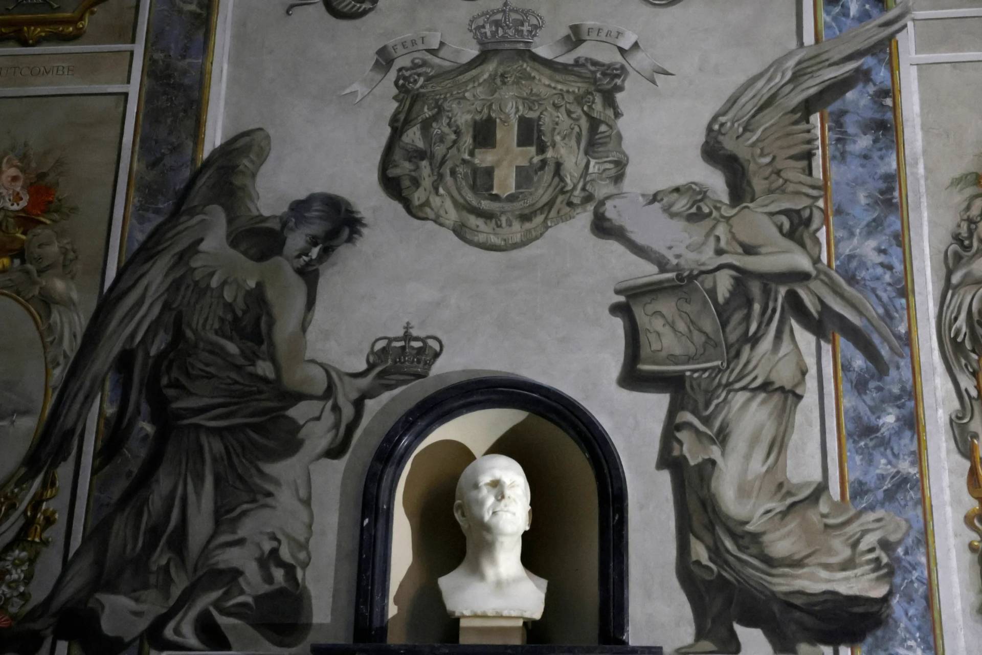 A painting inside the Basilica of San Lorenzo in Lucina in Rome depicting a cherub, right, that bore a striking resemblance to Italian Premier Giorgia Meloni shows signs of alteration after the face was removed, Wednesday, Feb. 4, 2026. (Credit: Cecilia Fabiano/LaPresse via AP.)