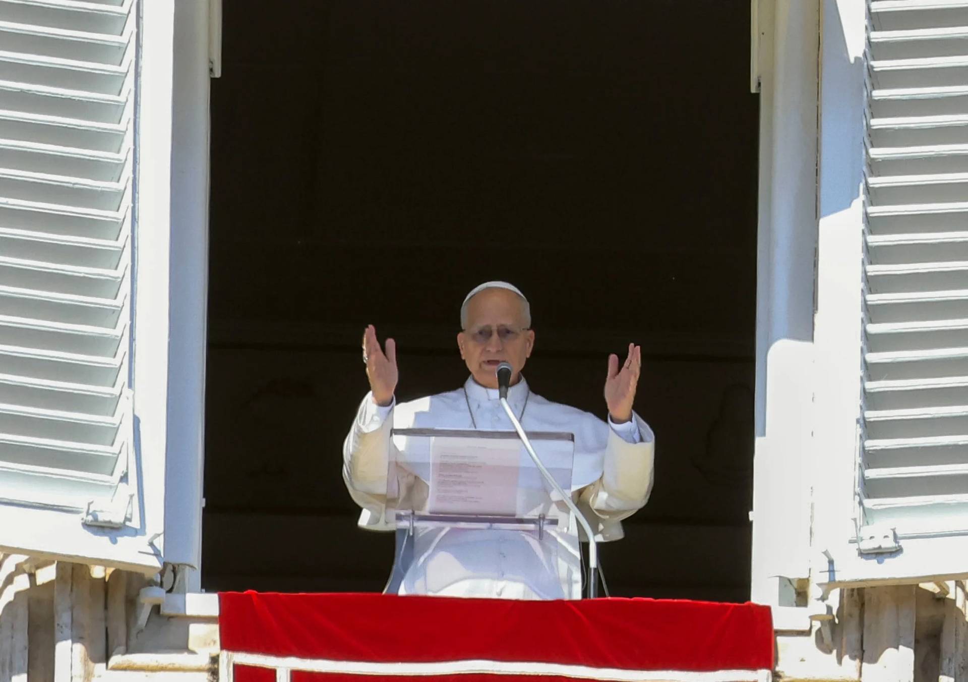 Pope Leo XIV appears at the window of his studio overlooking St. Peter's Square at the Vatican where Catholic faithful and pilgrims gathered for the traditional Sunday blessing at the end of the noon Angelus prayer, Sunday, Feb. 22, 2026. (Credit: Riccardo De Luca/AP.)