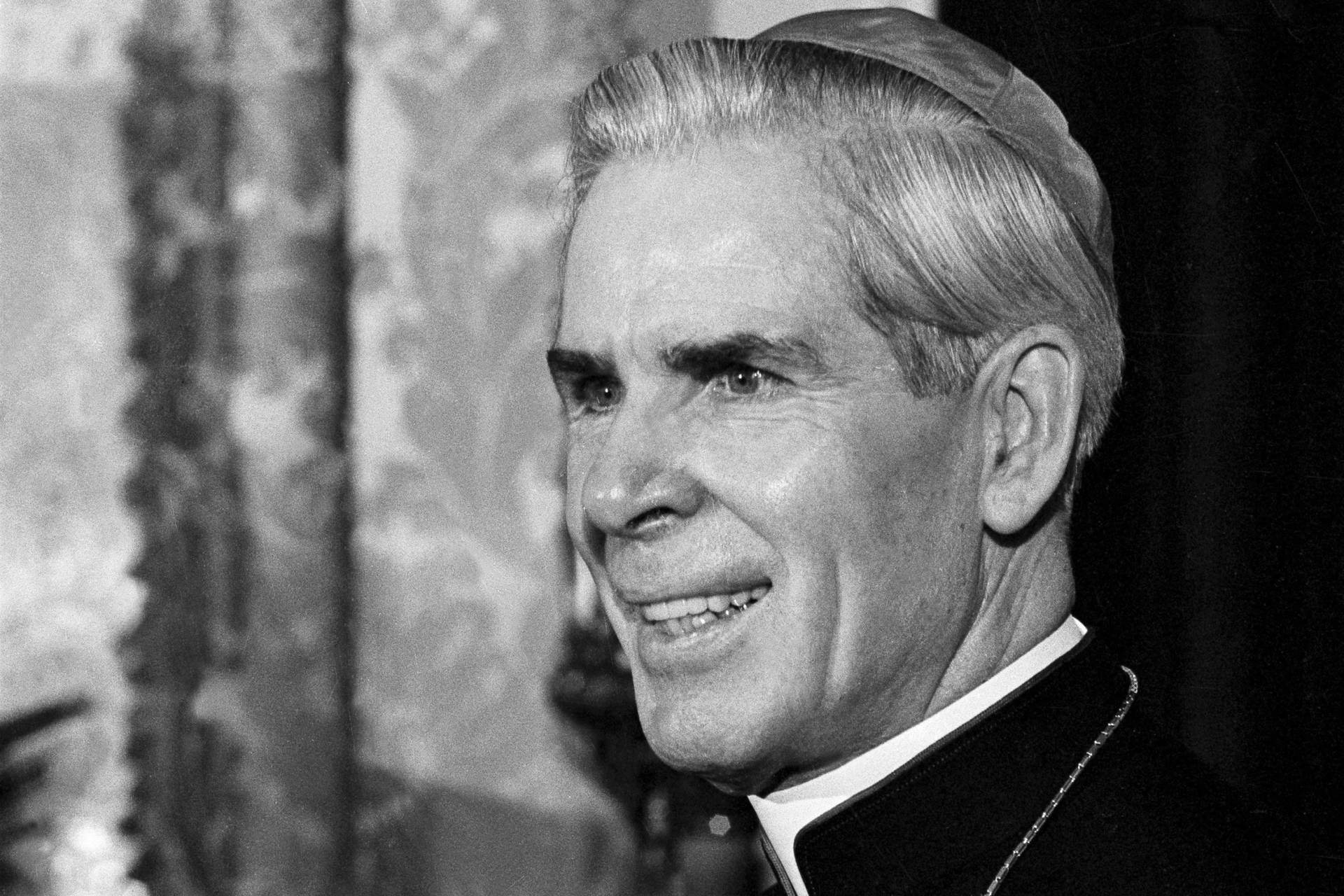 This Oct. 26, 1966 file photo shows Bishop Fulton J. Sheen in his office at the Propagation of Faith in New York. (Credit: Eddie Adams/AP.)