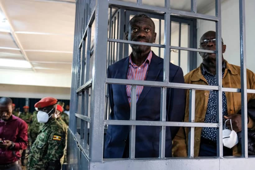 Ugandan opposition leader and four-time presidential candidate Kizza Besigye, stands in the dock at the Makindye Martial Court in Kampala, Uganda, Nov. 20. 2024. (Credit: Hajarah Nalwadda/AP.)