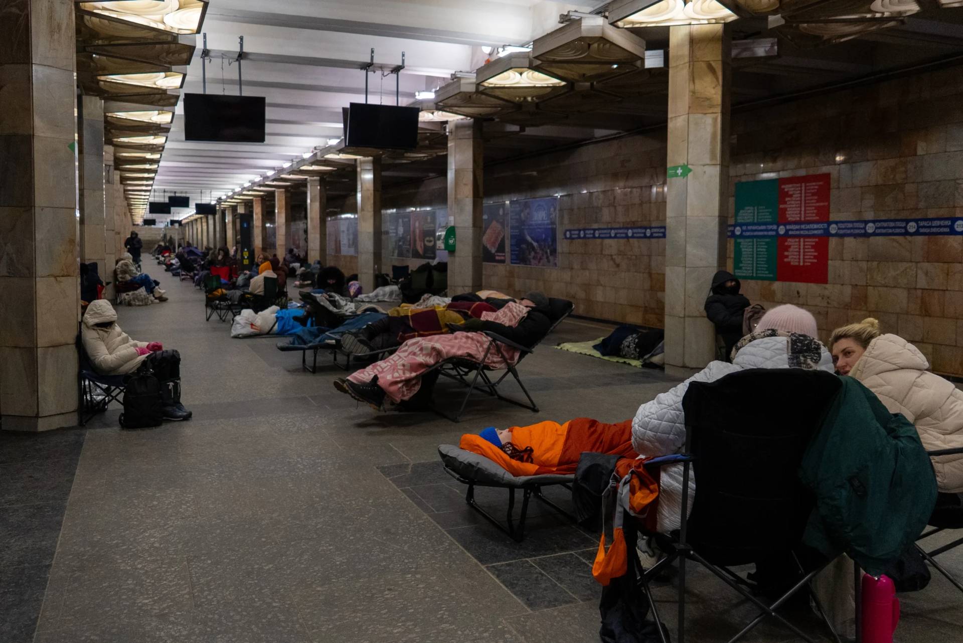 People take shelter in a metro station, being used as a bomb shelter, during a Russian drones attack in Kyiv, Ukraine, Tuesday, Feb. 3, 2026. (Credit: Alex Babenko/AP.)