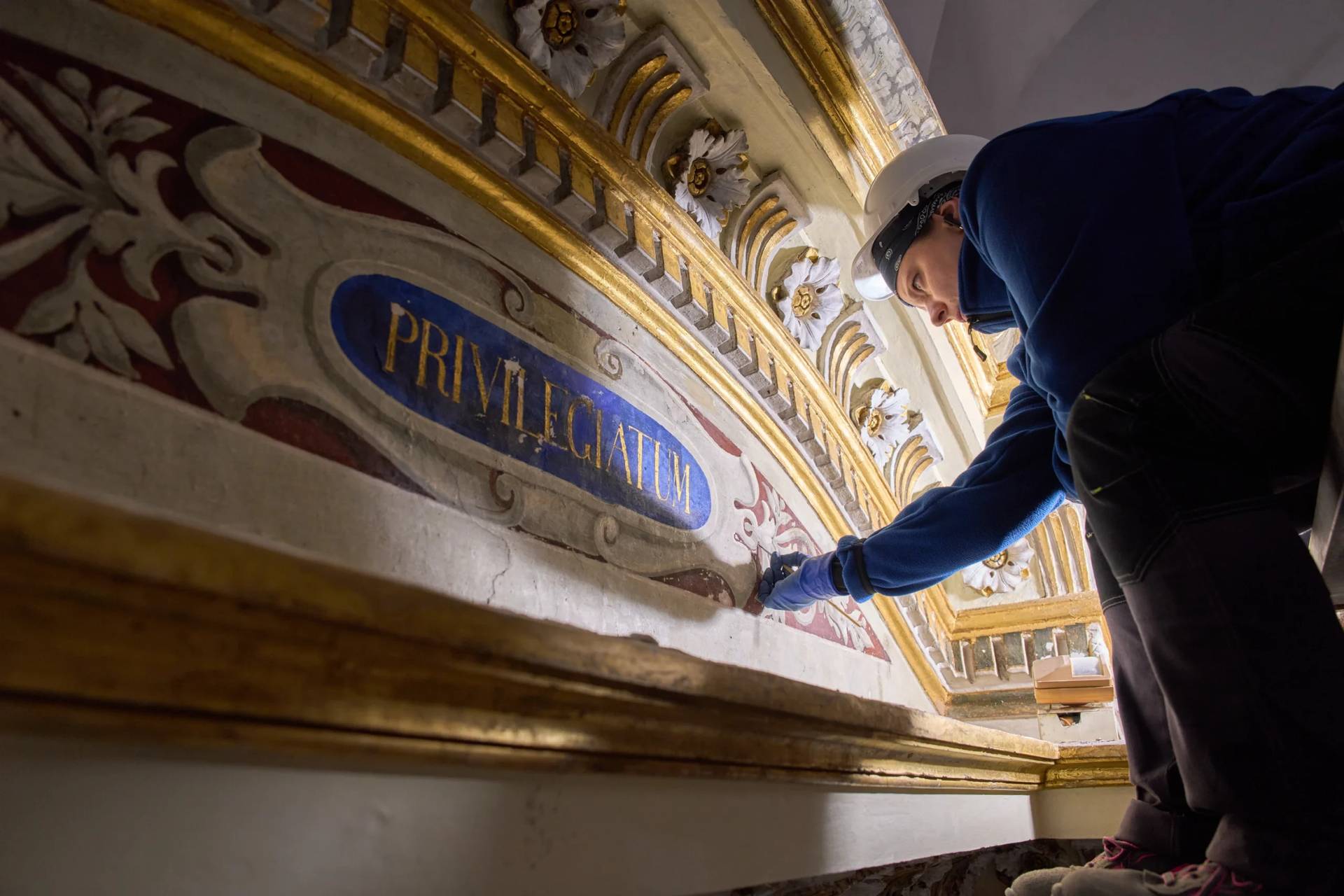 Restorer Domiziana Marchioro polishes the altar od St. Sebastian inside the Basilica of San Pietro in Vincoli in Rome, Monday, March 9, 2026. (Credit: Domenico Stinellis/AP.)