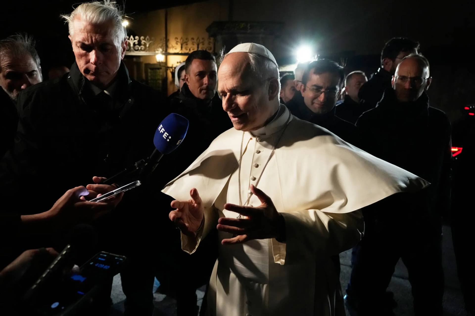Pope Leo XIV talks to journalists as he leaves his residence in Castel Gandolfo, on the outskirts of Rome, to return to the Vatican, Tuesday, March 31, 2026. (Credit: Gregorio Borgia/AP.)