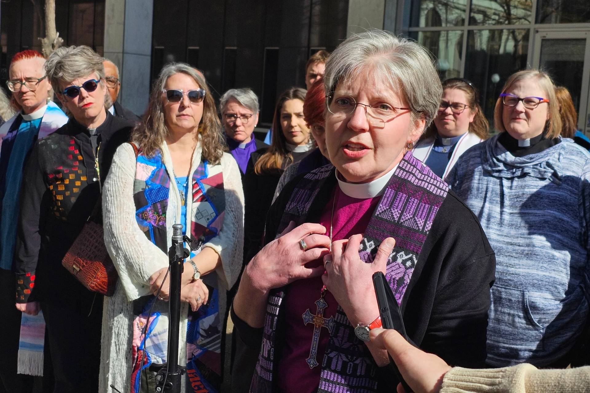 Bishop Jennifer Nagel, of the Minneapolis Synod of the Evangelical Lutheran Church in America, speaks to reporters outside the federal courthouse in St. Paul, Minn., on Friday, March 20, 2026, after a federal judge ruled that clergy will be allowed to minister to immigrants in a holding facility at the headquarters of the Trump administration's enforcement surge in Minnesota. (Credit: Steve Karnowski/AP.)