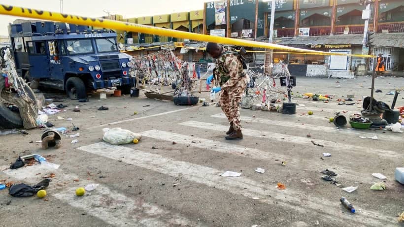 A soldier inspects an area attacked in Maiduguri, Nigeria, on March 7, 2026. (Credit: Jossy Ola/AP.)