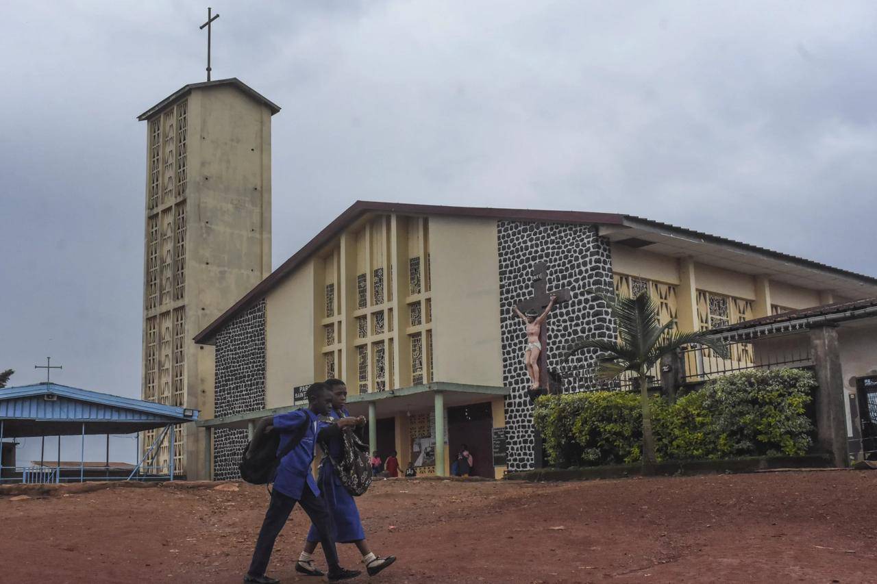 Children leave school in Dschang, Cameroon, on Dec. 1, 2024. (Credit: Robert Bociaga/AP.)