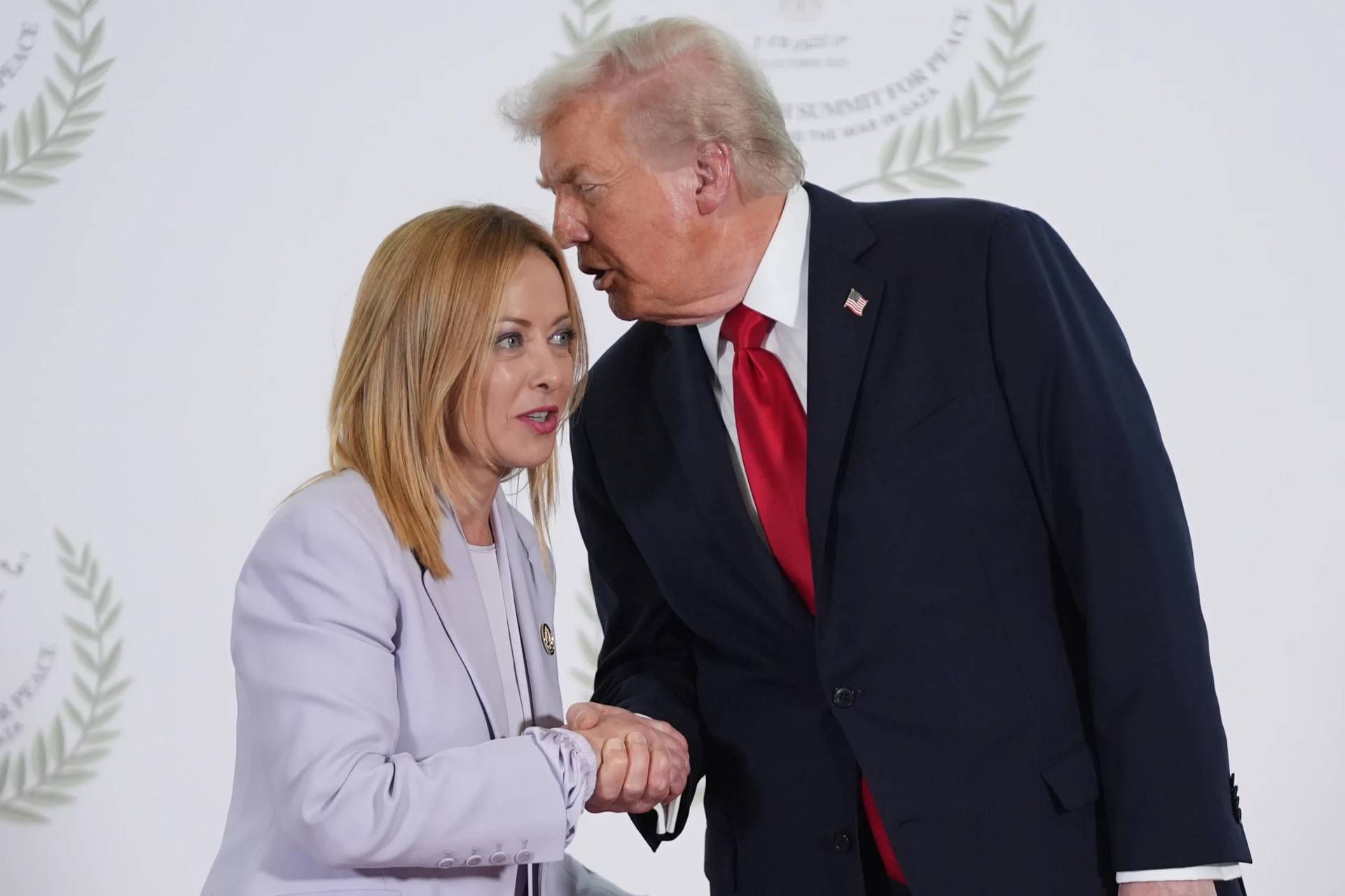 President Donald Trump greets Italy’s Prime Minister Giorgia Meloni during summit to support ending the more than two-year Israel-Hamas war in Gaza after a breakthrough ceasefire deal, Oct. 13, 2025, in Sharm El Sheikh, Egypt. (Credit: Evan Vucci/Pool via AP.)