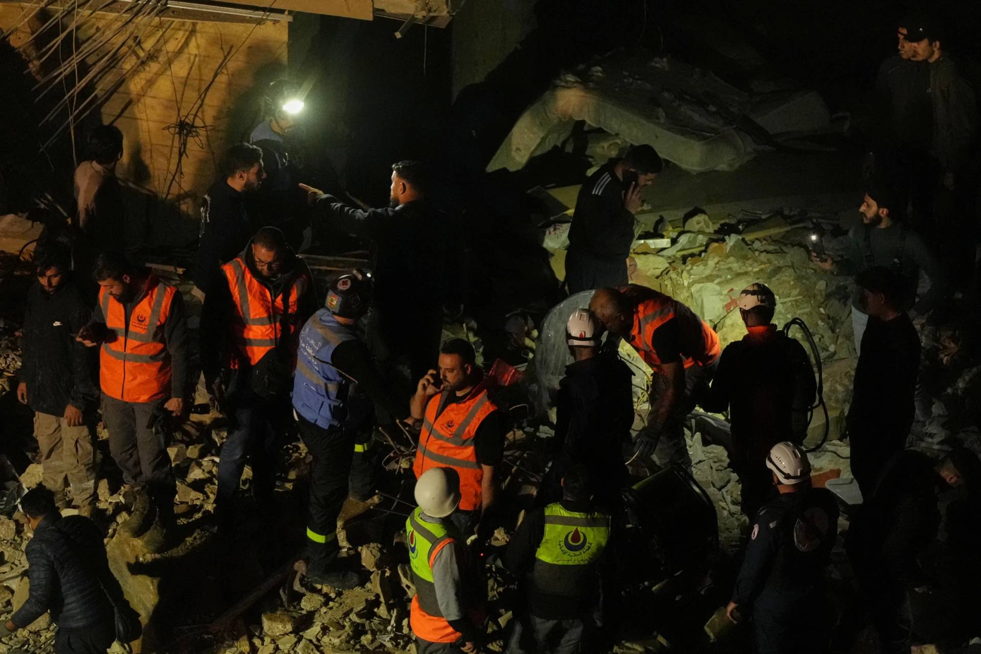 Rescue workers search through the rubble of a damaged building for survivors following an Israeli airstrike in Dahiyeh, Beirut's southern suburbs, Lebanon, Wednesday, May 6, 2026. (Credit: Hassan Ammar/AP.)