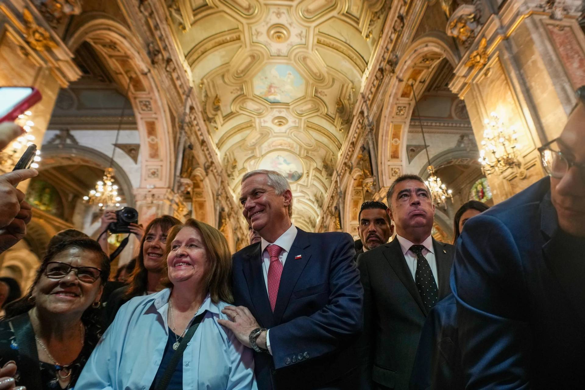 Chilean President José Antonio Kast and his wife Maria Pia Adriasola greet supporters at the Santiago Cathedral in Santiago, Chile on Dec. 19, 2025. (Credit: Esteban Felix/AP.)