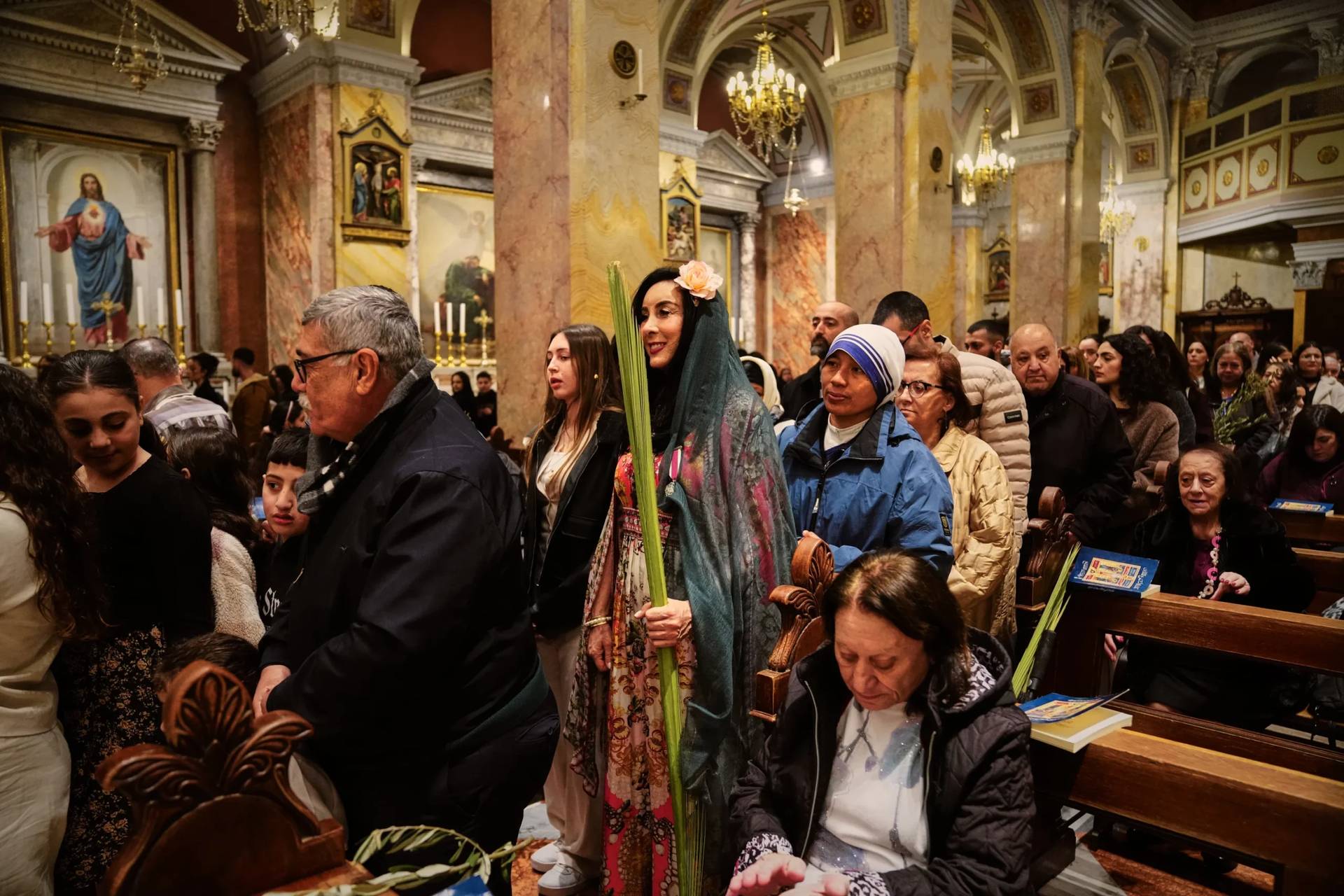 Catholics attend Mass at Palm Sunday in Jerusalem on March 29, 2026. (Credit: Mahmoud Illean/AP.)