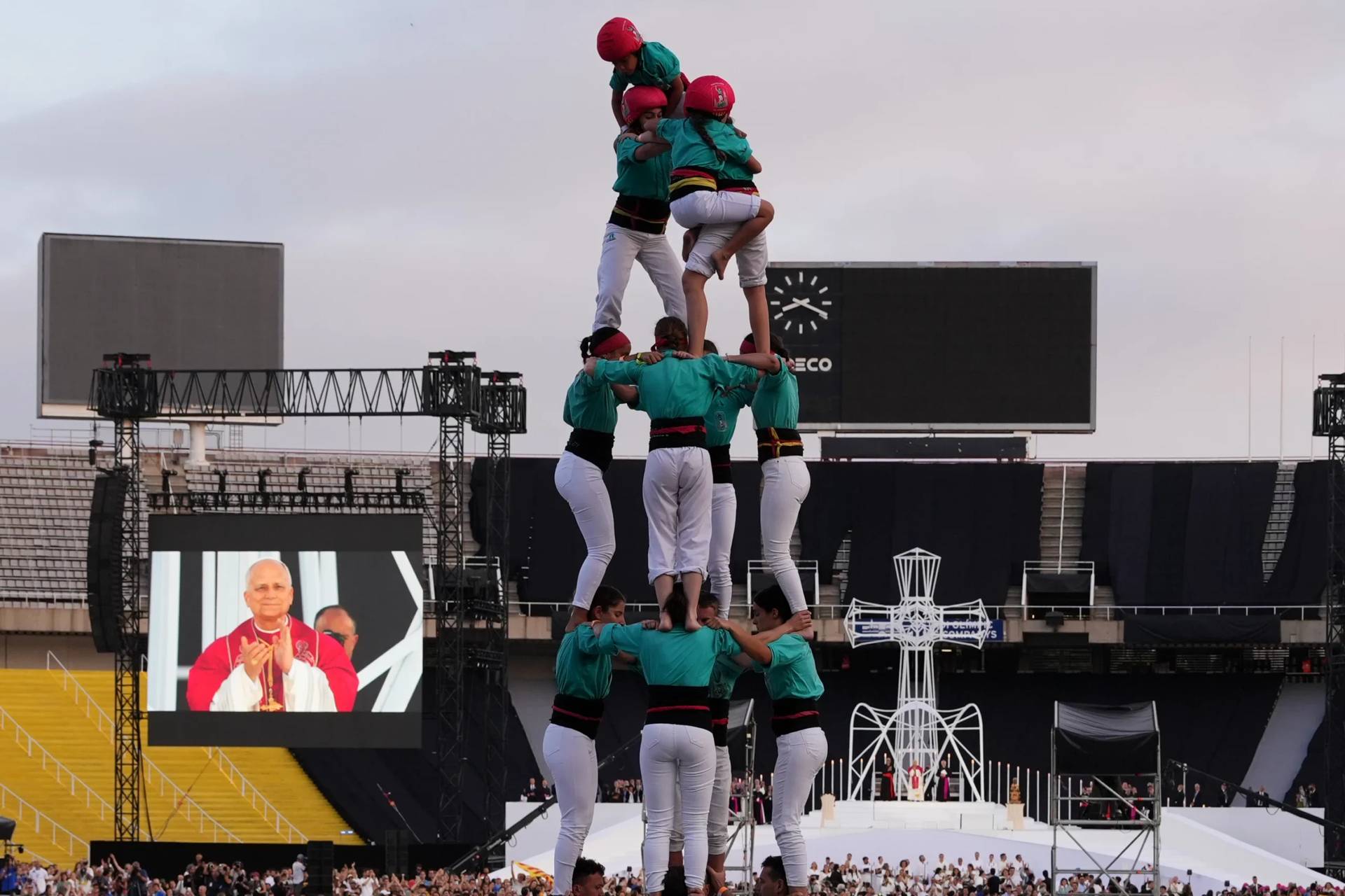 Performers make a Catalonian human tower, known as Castells, for Pope Leo XIV as he leads a vigil of prayer at the Lluis Companys Olympic Stadium, in Barcelona, Tuesday, June 9, 2026. (Credit: Alessandra Tarantino/AP.)