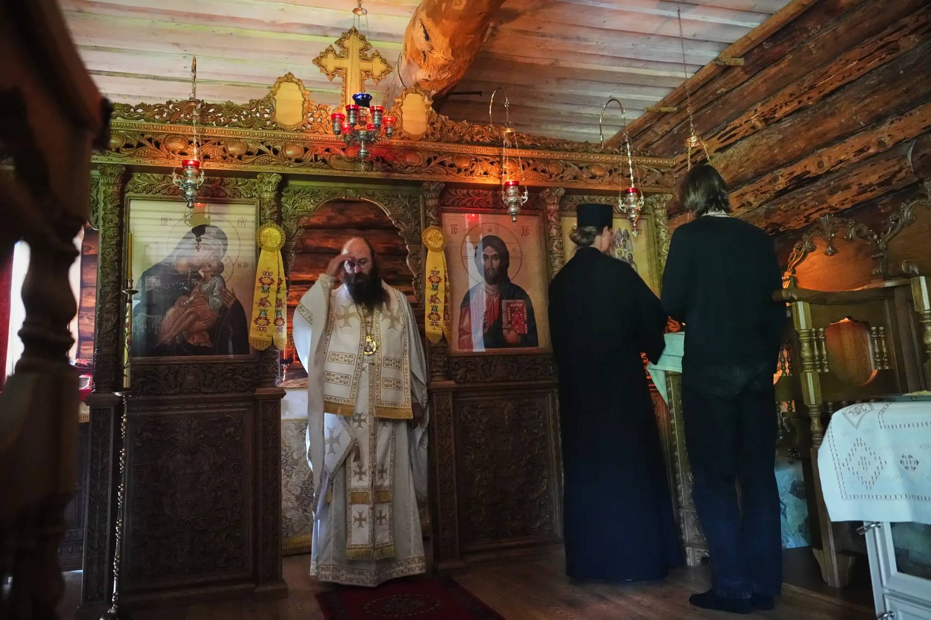 Estonia Monastery Bishop Damaskinos, centre left, prays during the Divine Liturgy in the chapel of the newly founded Kirikla Orthodox Monastery in Pihali village, Estonia, on July 4, 2026. (Credit: Sergei Grits/AP.)