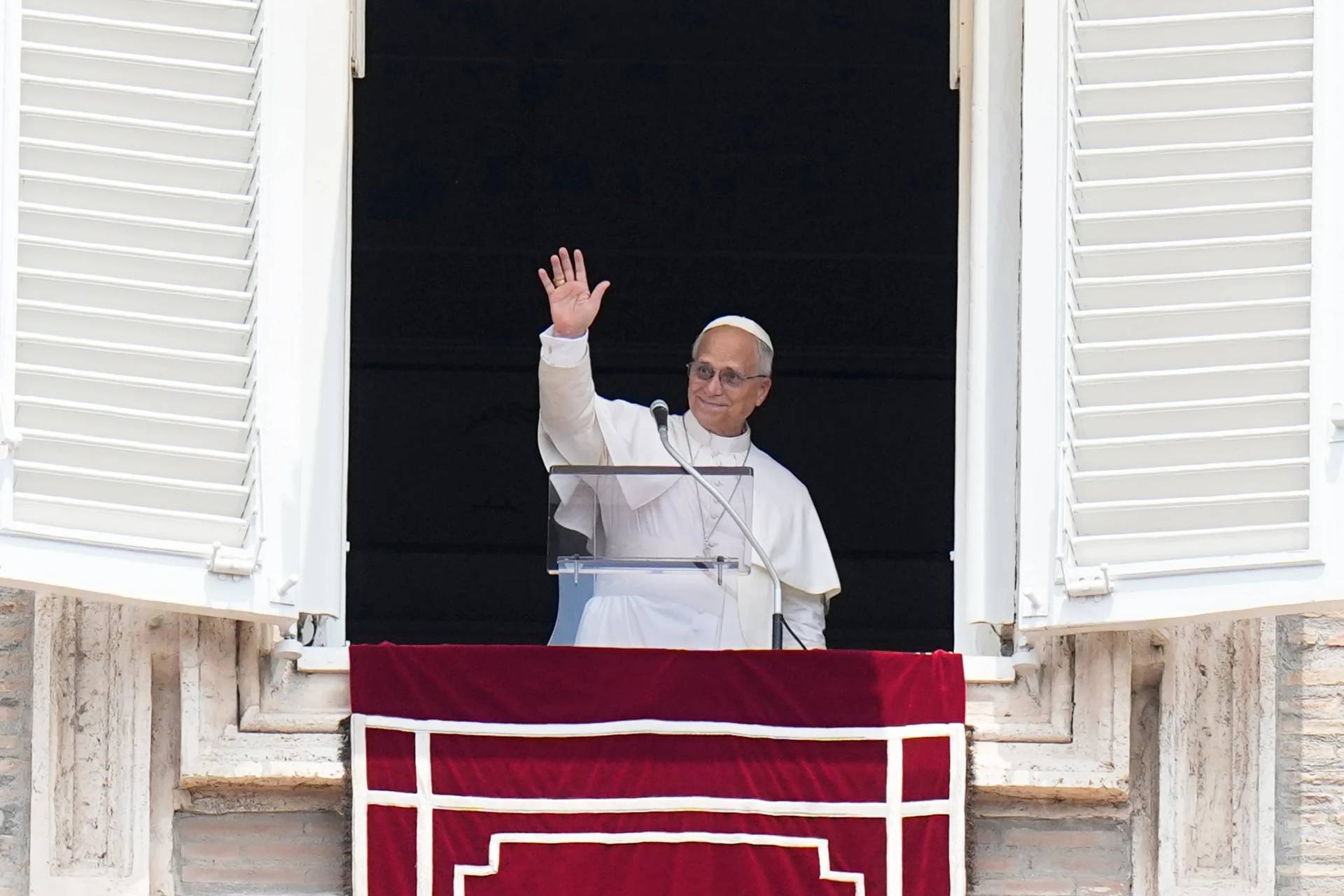 Pope Leo XIV waves during the Angelus noon prayer from the window of his studio overlooking St.Peter's Square, at the Vatican, Monday, June 29, 2026. (Credit: Alessandra Tarantino/AP.)