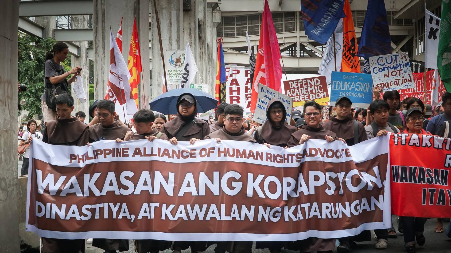 Filipino Franciscan friars are among the thousands in a rally along Commonwealth Avenue in Quezon City, Philippines, as President Ferdinand Marcos Jr. delivers his fifth State of the Nation Address, July 27, 2026. (Credit: Franciscan Communications.)