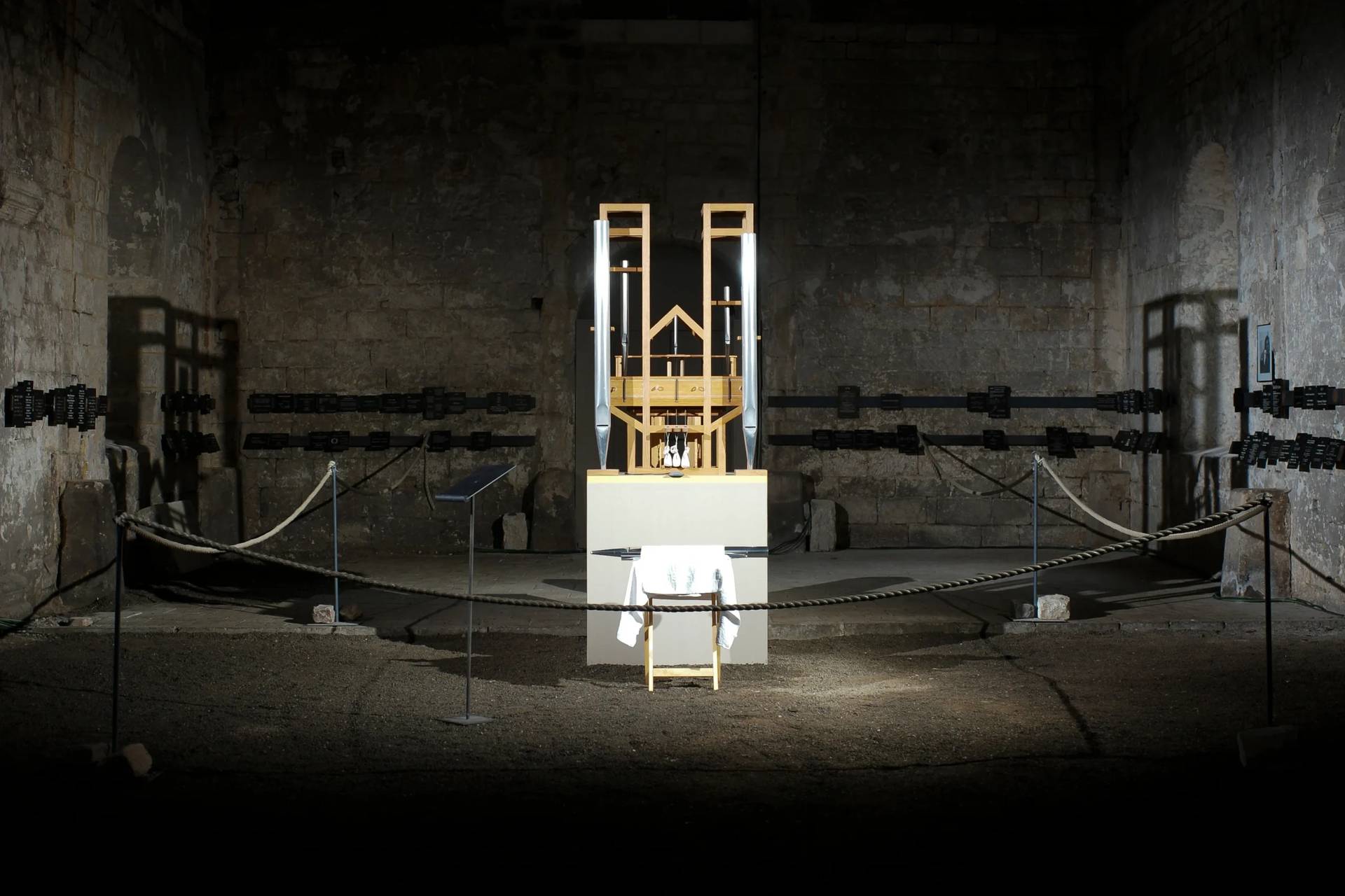 The organ of the John Cage organ project is illuminated prior to a ‘sound change’ at the Buchardi Church in Halberstadt, Germany, Sept. 5, 2020. (Credit: Markus Schreiber/AP.)