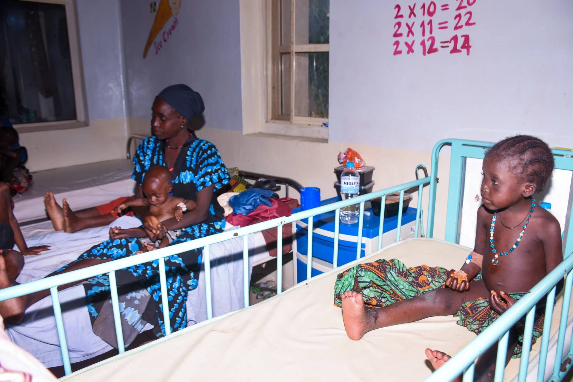 Women and children who were rescued after being held in a forest after they were abducted from the Woro community by gunmen in February receive medical attention at a hospital Ilorin, Nigeria, on Aug. 7, 2026. (Credit: Abubakar Khadijak/AP.)