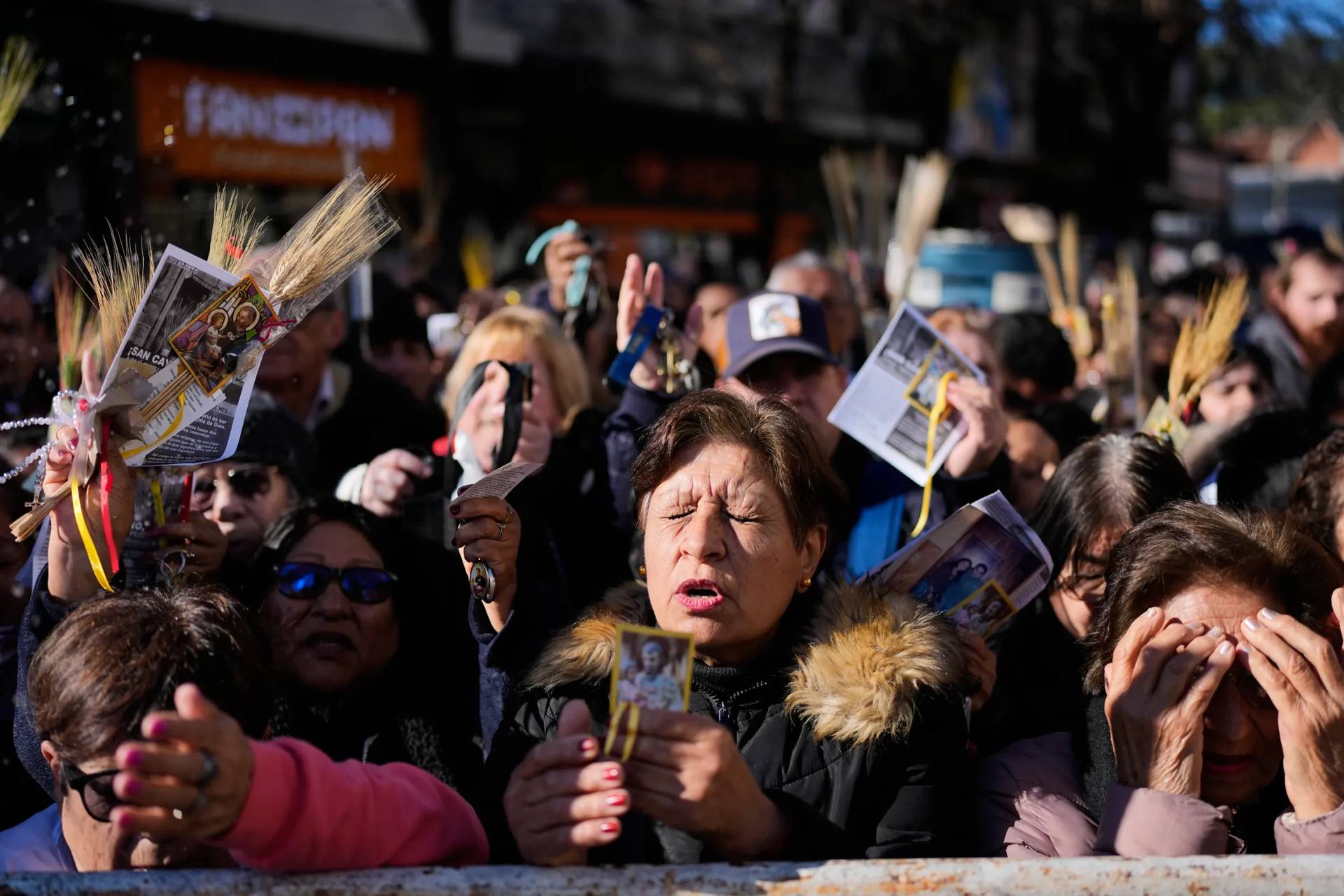Pilgrims attend an outdoor Mass outside the Church of San Cayetano during the annual pilgrimage honoring Saint Cajetan, the patron saint of work, in Buenos Aires, Argentina, Friday, Aug. 7, 2026. (Credit: Natacha Pisarenko/AP.)