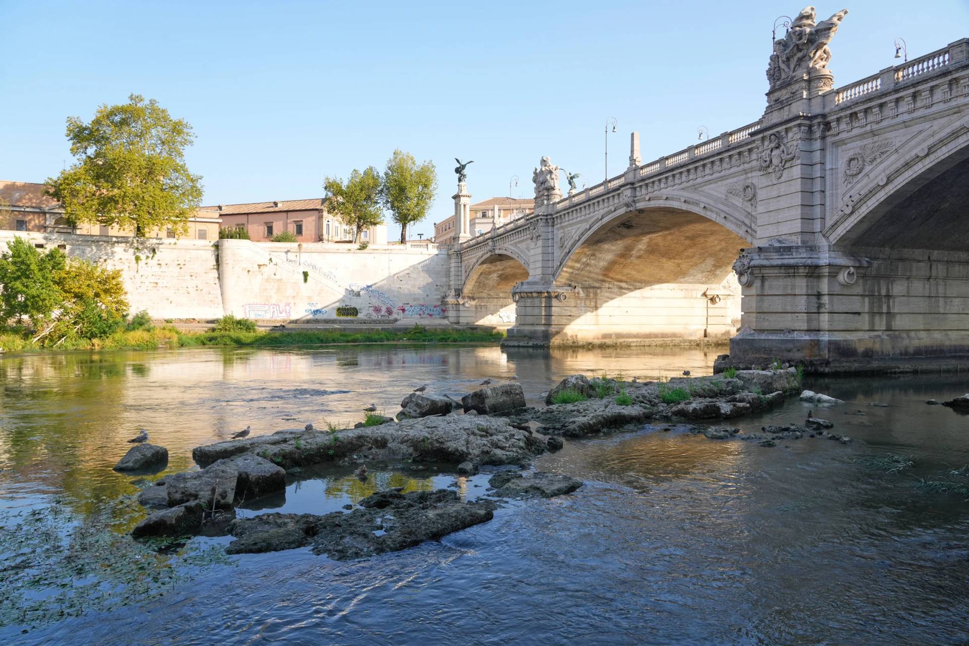 The ruins of the ancient Roman Neronian bridge, emerge from the riverbed of the Tiber river due to drought, in Rome, Thursday, Aug. 13, 2026. (Credit: Gregorio Borgia/AP.)