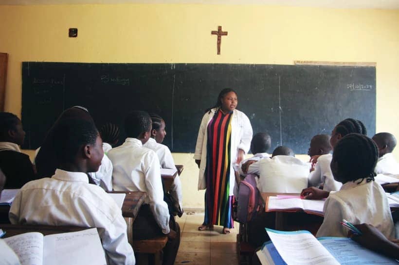Students listen to the teacher in the Holy Infant high school, in Yaounde, Cameron, Monday, Oct. 7, 2024. (Credit: Angel Ngwe/AP.)