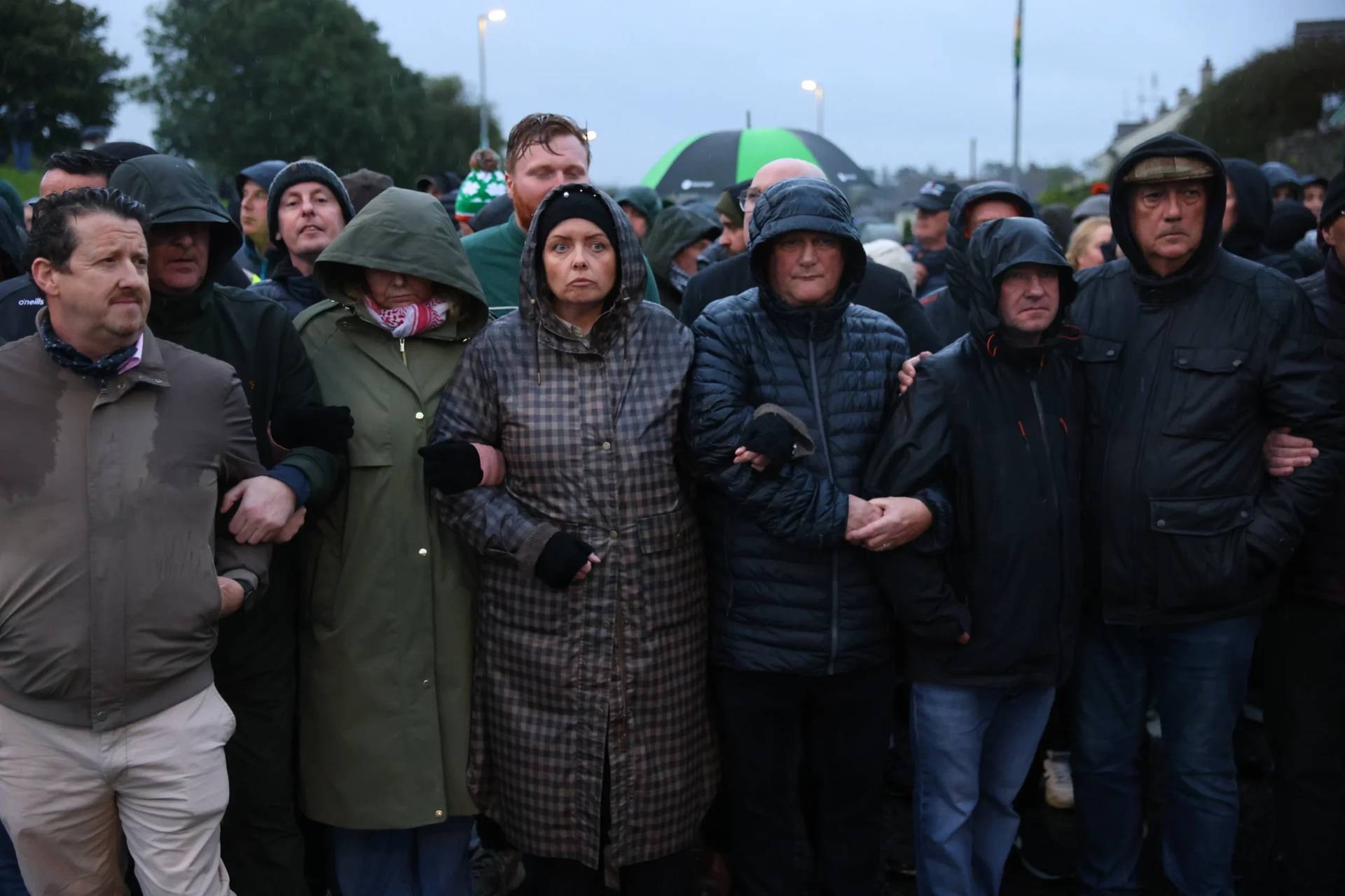 Protestors block the Garvaghy road ahead of a Portadown District Loyal Orange Lodge No. 1 march in the first parade for almost 30 years in Portadown, Northern Ireland, on Sep. 27, 2026. (Credit: Peter Morrison/PA via AP.)
