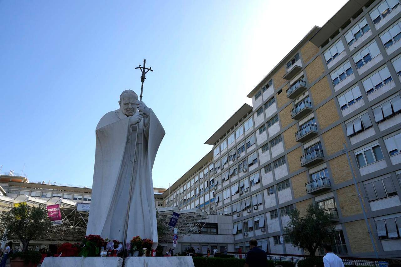 The statue of Pope John Paul II is seen at the entrance of the Agostino Gemelli Polyclinic in Rome, Wednesday, July 7, 2021. (Credit: Alessandra Tarantino/AP.)