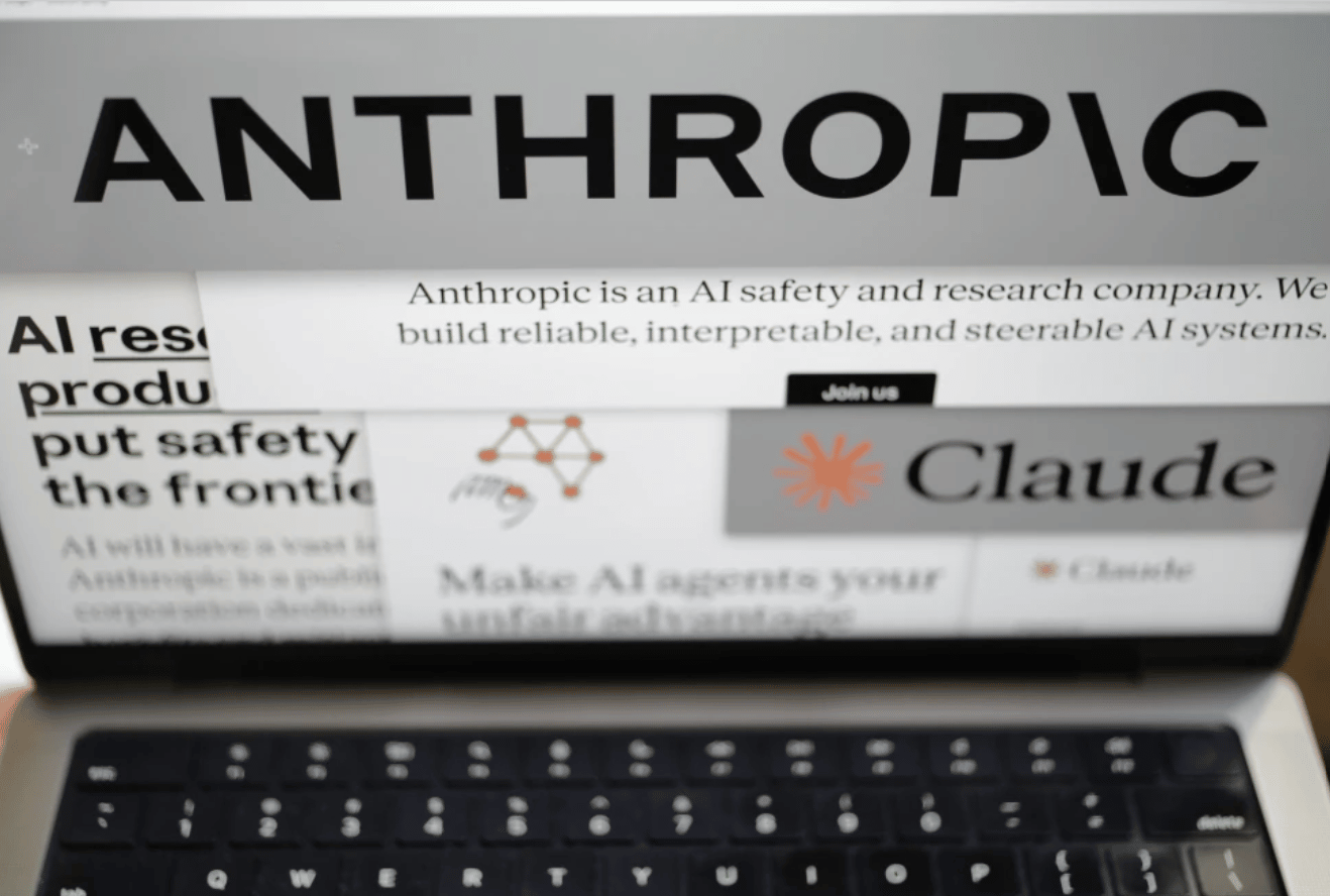 Pages from the Anthropic website and the company’s logos are displayed on a computer screen in New York on Thursday, Feb. 26, 2026. (Credit: Patrick Sison/AP.)