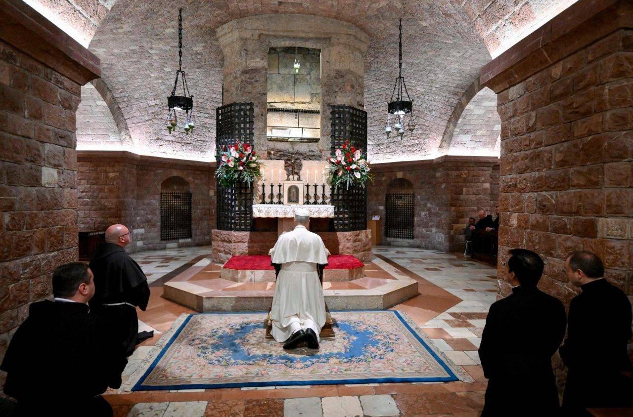 Pope Leo XIV praying at the tomb of Saint Francis in Assisi, Italy, Nov. 20, 2025. (Credit: Vatican Media.)