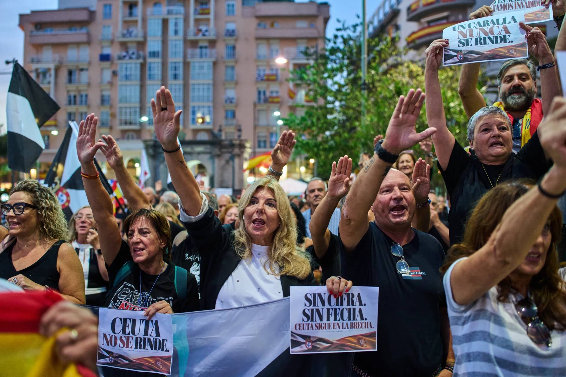 Local residents protest the Spanish government's handling of the Ceuta border crisis, two months after it occurred, in the Spanish enclave of Ceuta, Wednesday, Sept. 30, 2026. Banners read in Spanish: "Ceuta does not give up". (Credit: Bernat Armangue/AP.)